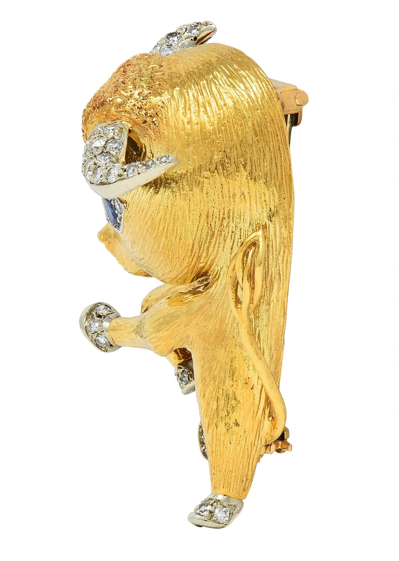 Brooch is designed as a stylized whimsical bull with groove-textured features
Featuring a detailed brushed gold body and high polish gold tail
With platinum ears and hooves - bead set with round brilliant cut diamonds
Weighing approximately 0.84