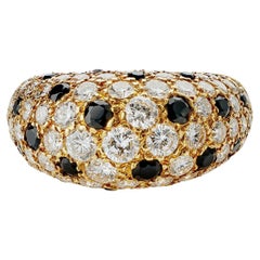 Macklowe Gallery  David Webb Rock Crystal and Hammered Gold Bombé Ring —  MackloweGallery