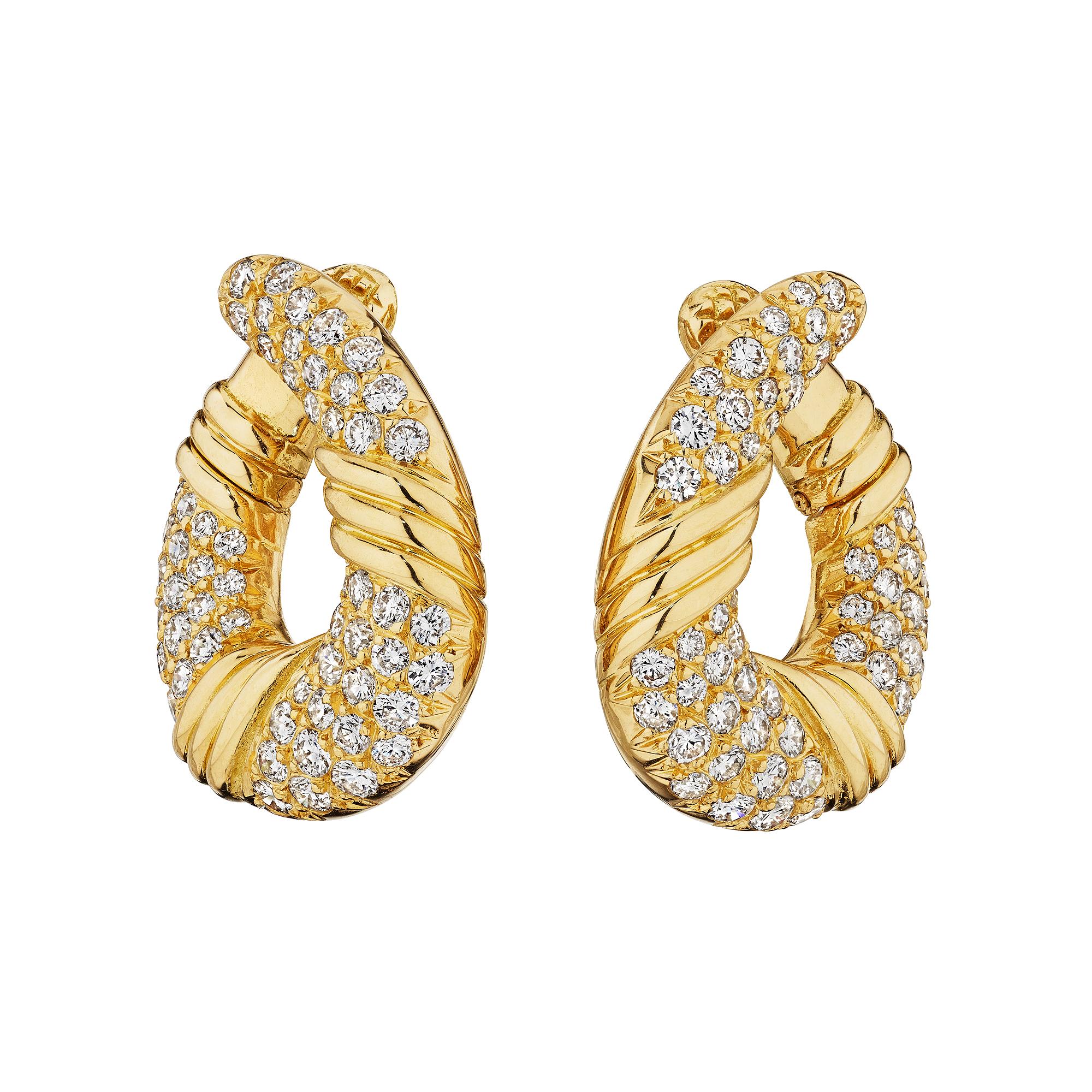 Gracefully elegant these Van Cleef & Arpels Paris diamond and 18 karat yellow gold modernist clip hoop earrings are hard to find but easy to wear.  Signed Van Cleef & Arpels Paris.  Circa 1980-1990. Total diamond weight 2.30 carats. 7/8