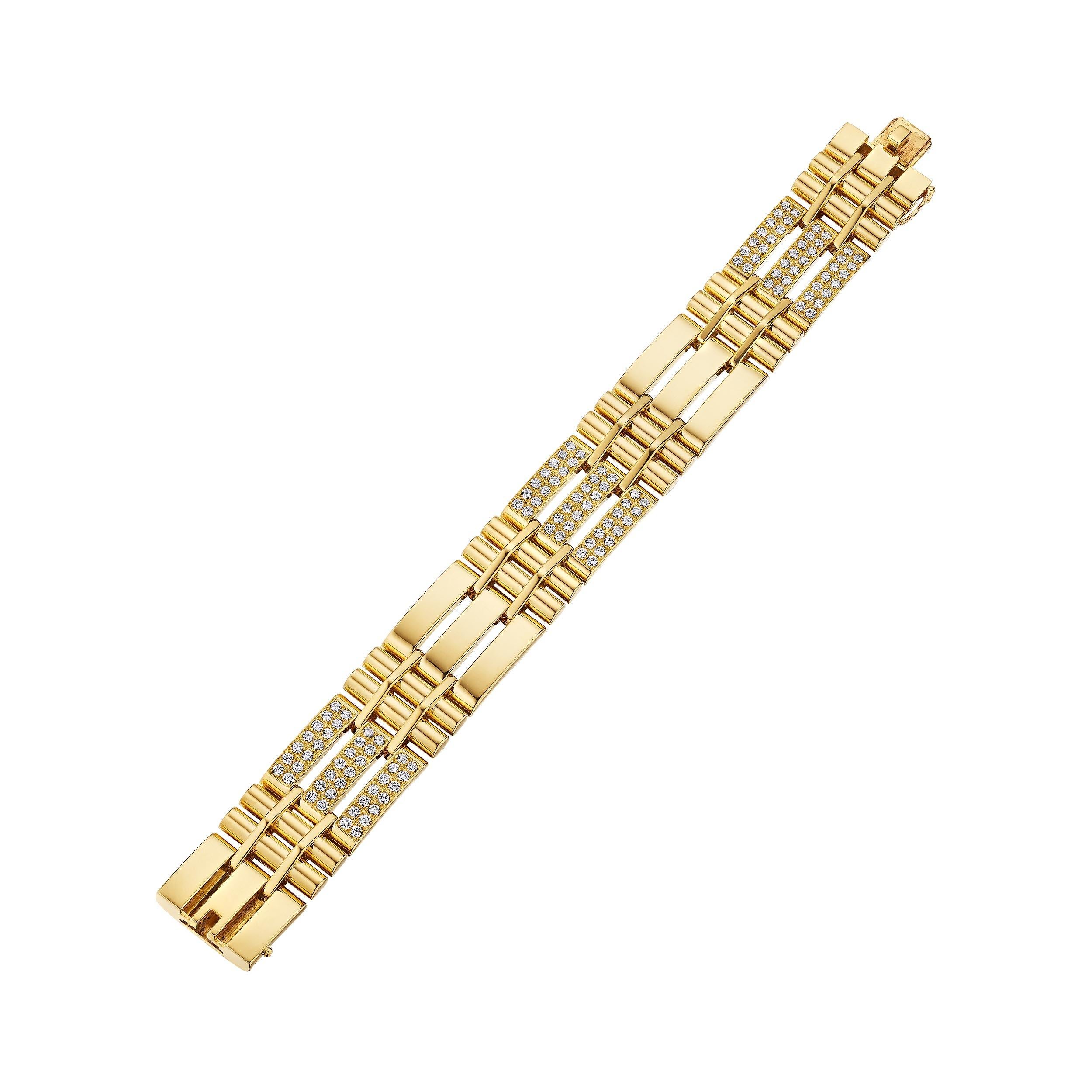 Célébrant la pureté et la puissance d'un grand design, ce bracelet à maillons moderniste en or jaune 18 carats Van Cleef & Arpels Paris Georges L'Enfant, serti de diamants, est envoûtant.  Signé Van Cleef & Arpels avec le numéro de série M35404. 