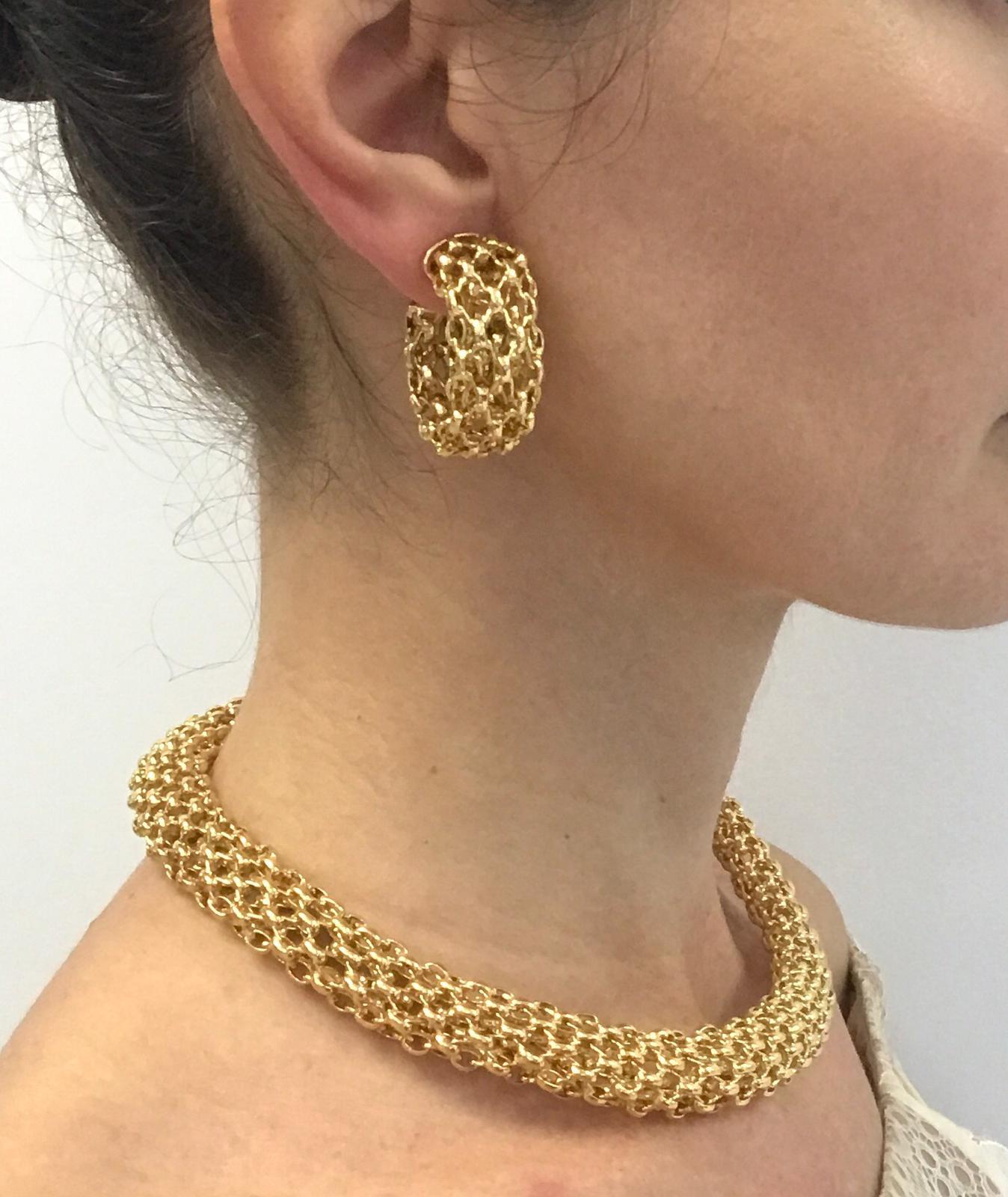 Van Cleef and Arpels!
 Beautiful open woven-link  design demi-parure consisting of matching necklace and ear-clips.
French eagle assay hallmark, signed and numbered.
Weight of 18k 190 grams
Necklace length is 17.25”
Made in France
