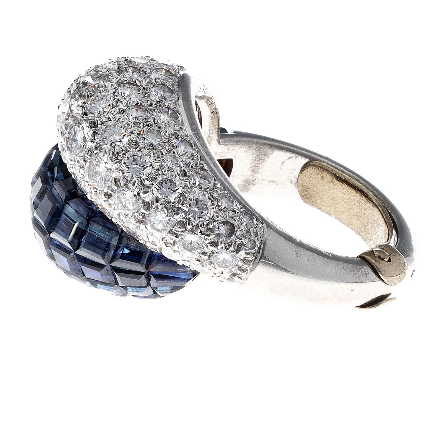 Van Cleef & Arpels Paris Invisibly Set Diamond Sapphire Double Boule Ring

From Our Signed Jewels Vintage Collection.
Invisible sapphires and diamonds set in platinum  Fully signed Van Cleef & Arpels and marked.
