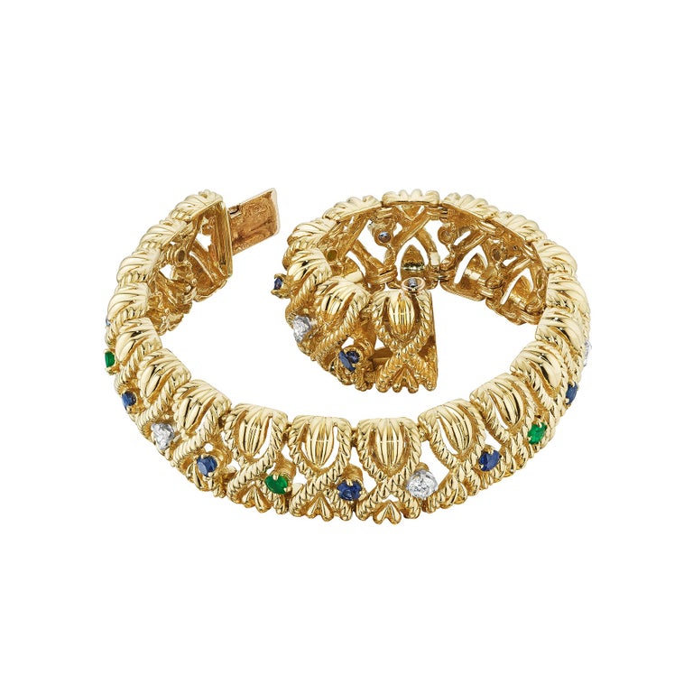 Modernist Van Cleef & Arpels Paris Mid-Century Emerald Sapphire Diamond Gold 'X' Bracelet For Sale