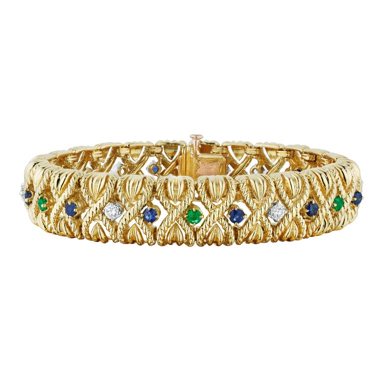 Van Cleef & Arpels Paris Mid-Century Emerald Sapphire Diamond Gold 'X' Bracelet For Sale