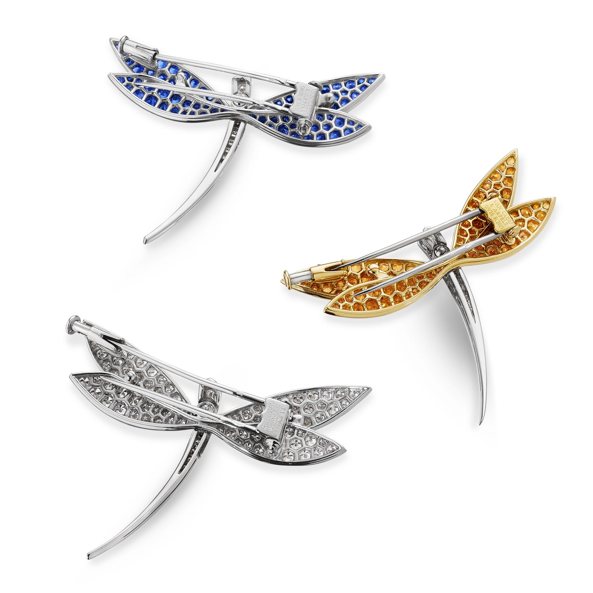 Ephermeral, and illusory, dragonflies have flown the earth for 300 million years and have come to symbolize the ability to overcome times of hardship and are the ultimate omen for good luck.  These three iridescent Van Cleef & Arpels Paris vintage