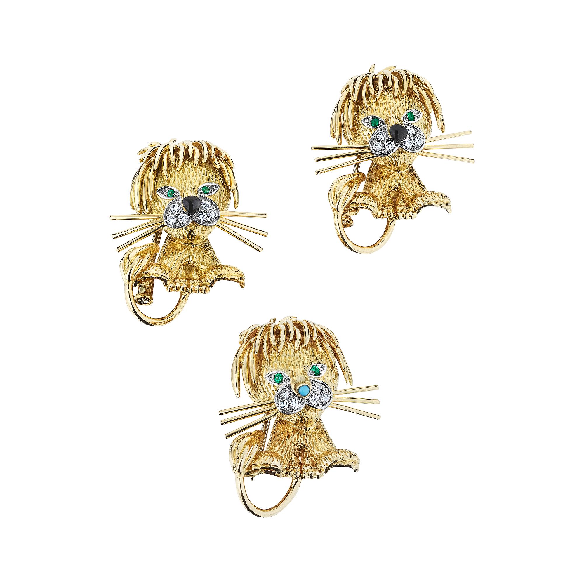 Keep your baby lion cub close to you when wearing this adorable Van Cleef & Arpels Paris vintage diamond emerald brooch.  With its black enamel nose, emerald eyes, and diamond face, this frisky lion cub will keep you purring.  Worn alone or as a