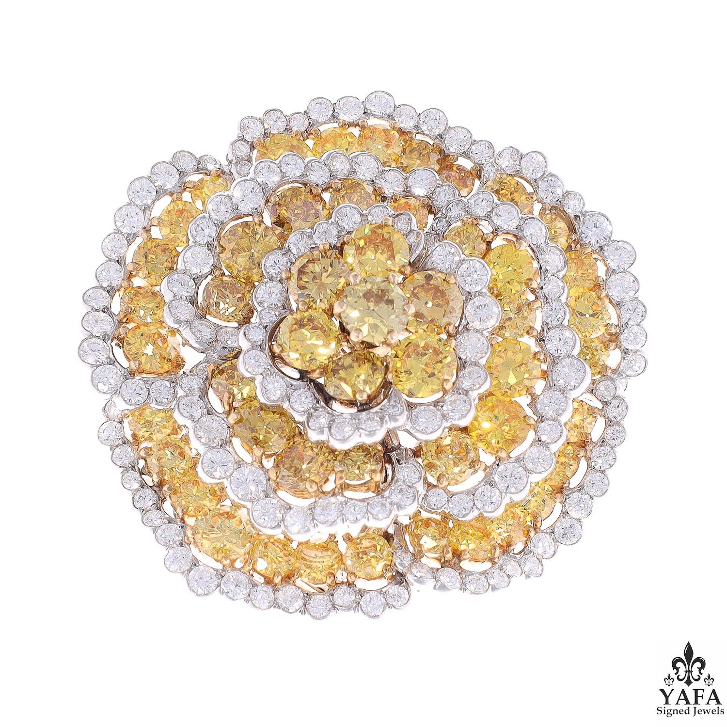 Van Cleef & Arpels Paris Vintage Fancy Yellow White Diamond 'Camellia' Brooch from our Signed Vintage Jewels Collection
In 1957 Van Cleef & Arpels introduced the “Camellia” design, which showcased alternating rows of circular-cut diamonds and