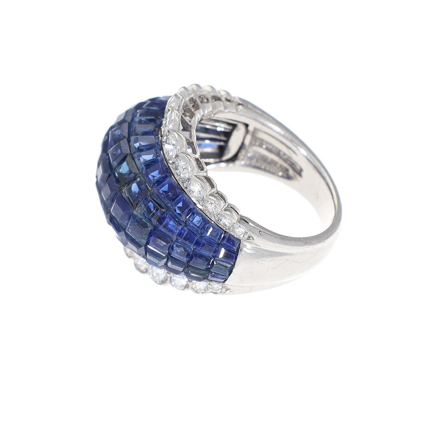 
Van Cleef & Arpels Paris Vintage Invisibly Set Diamond Sapphire  Boule Ring From Our Signed Jewels Vintage Collection.
 Platinum. Fully signed Van Cleef & Arpels and marked.
  SIZE- 5.75
APPROX. WIDTH- .62
