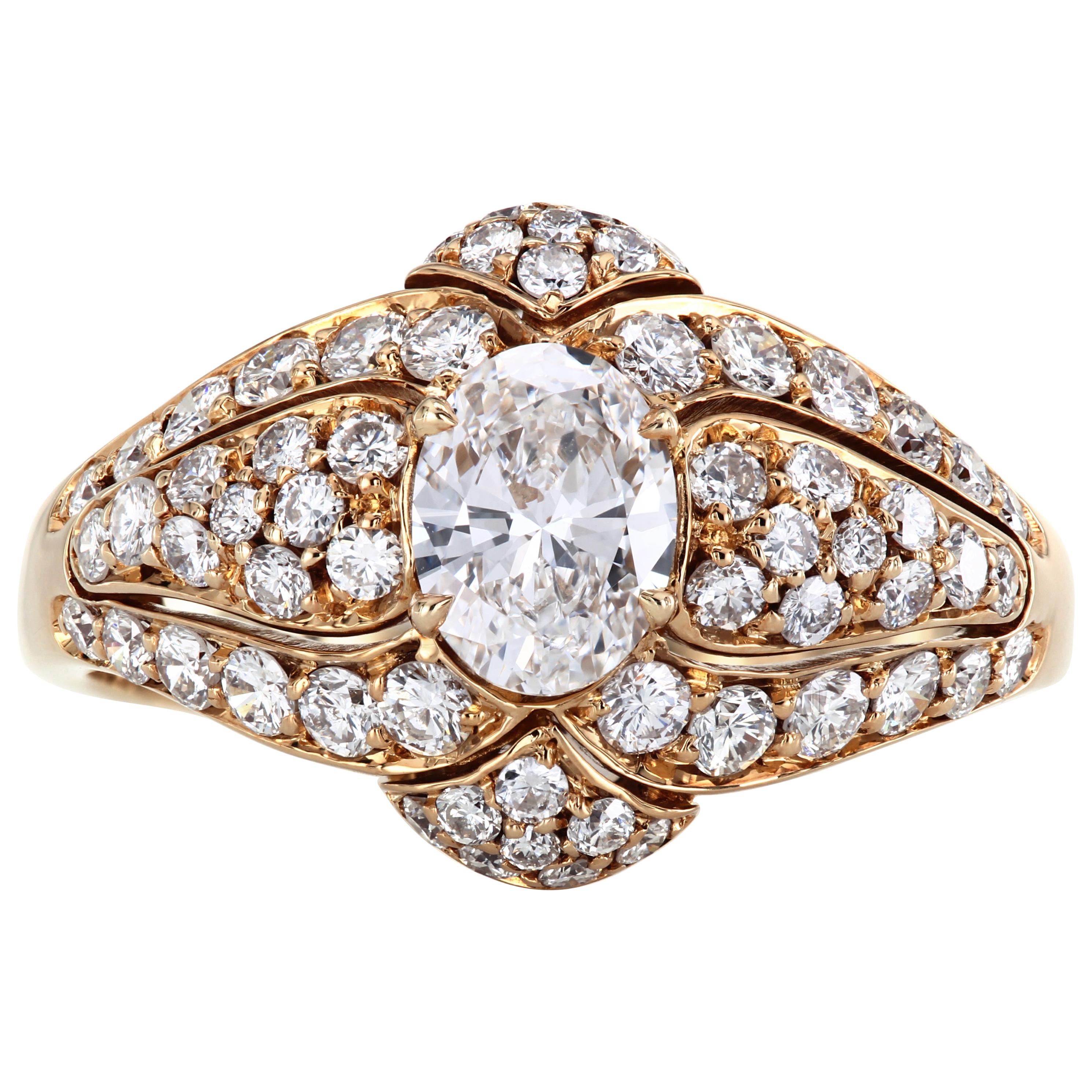 Van Cleef and Arpels ring with an oval diamond approx. 0.55-ct  D/E  VVS
Diamond pave - 60 diamonds approximately 1.5-carat weight
Stamped 5K332-7 Italy 18K
18K yellow gold 
Size 5, can be sized (additional charge)