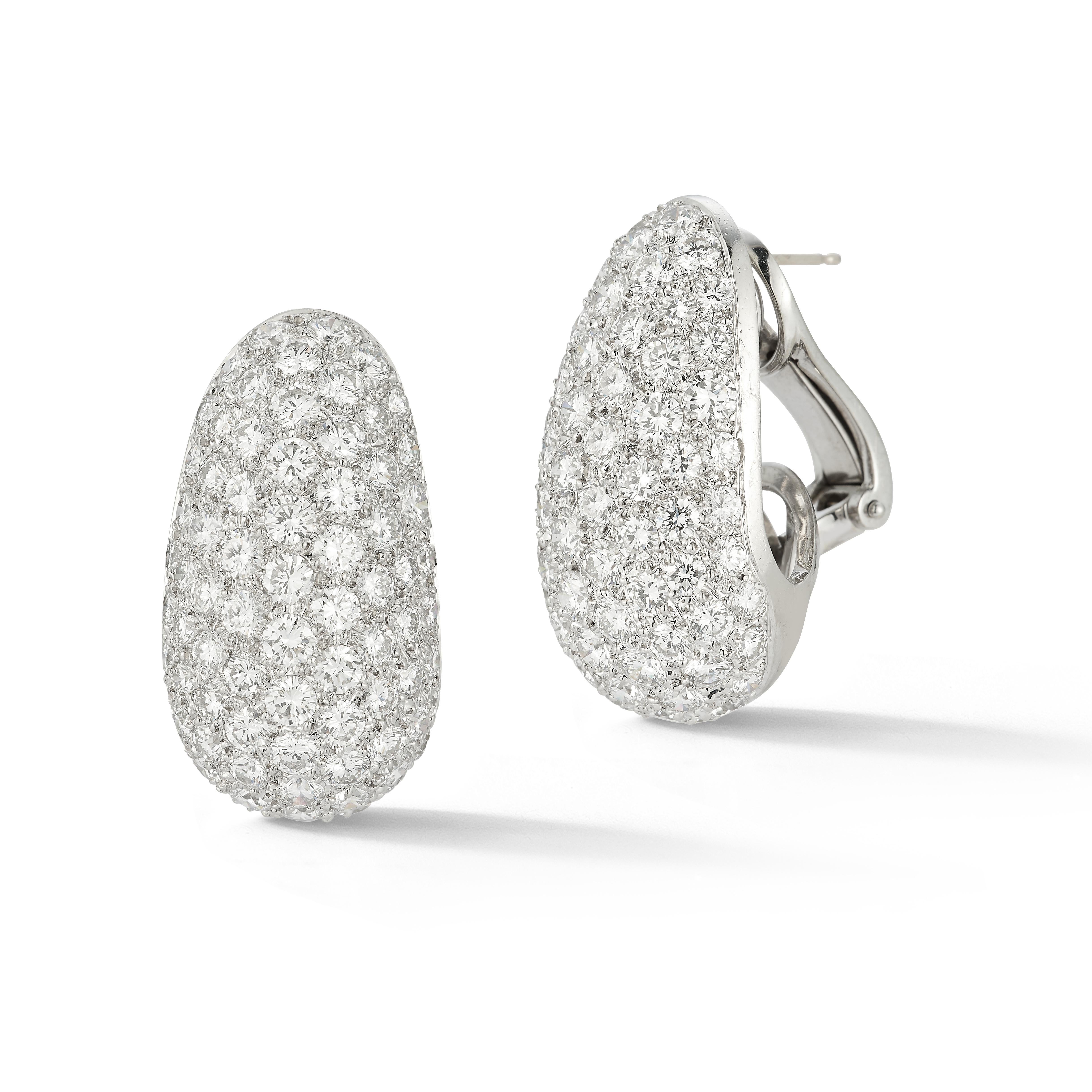 Van Cleef & Arpels Pave Diamond Earrings

A pair of platinum earrings set with 154 round cut diamonds weighing approximately 10.78 carats

Signed VCA and numbered

Length: 1.13