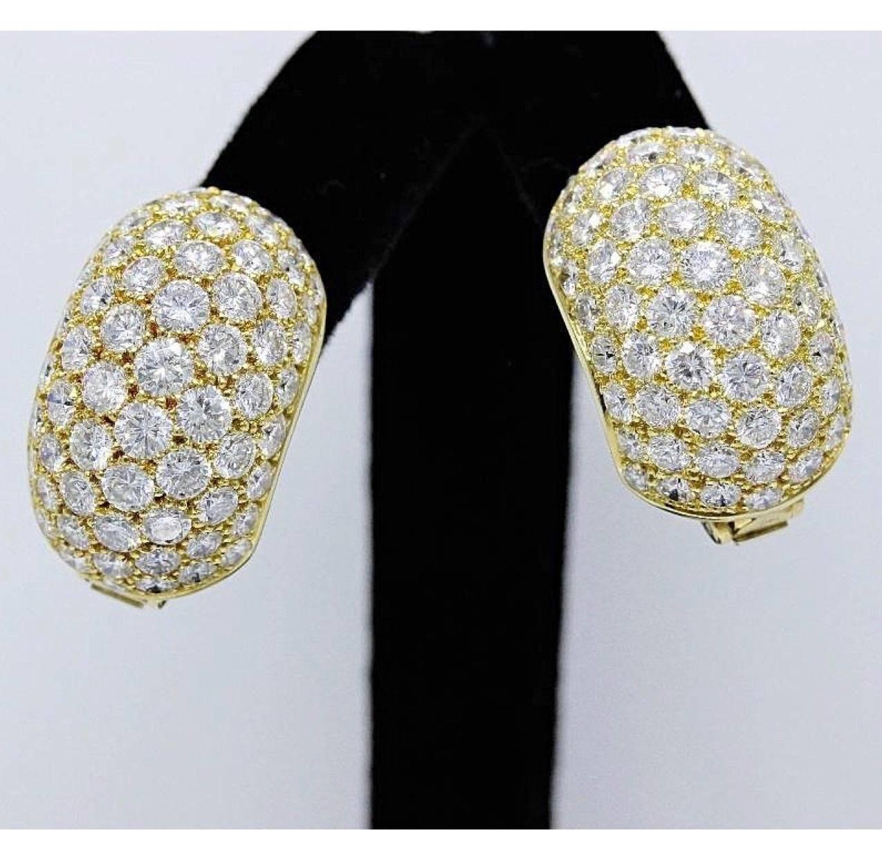 Van Cleef & Arpels 
Pave Diamonds Huggie Earrings in 18KT Yellow Gold .  
132 Round Brilliant Diamonds 13.50 TCW F color, VVS clarity.  
Serial Number N.Y.61681 ..... Earrings are stamped 18K 750©VAN CLEEF & ARPELS N.Y.61681.  