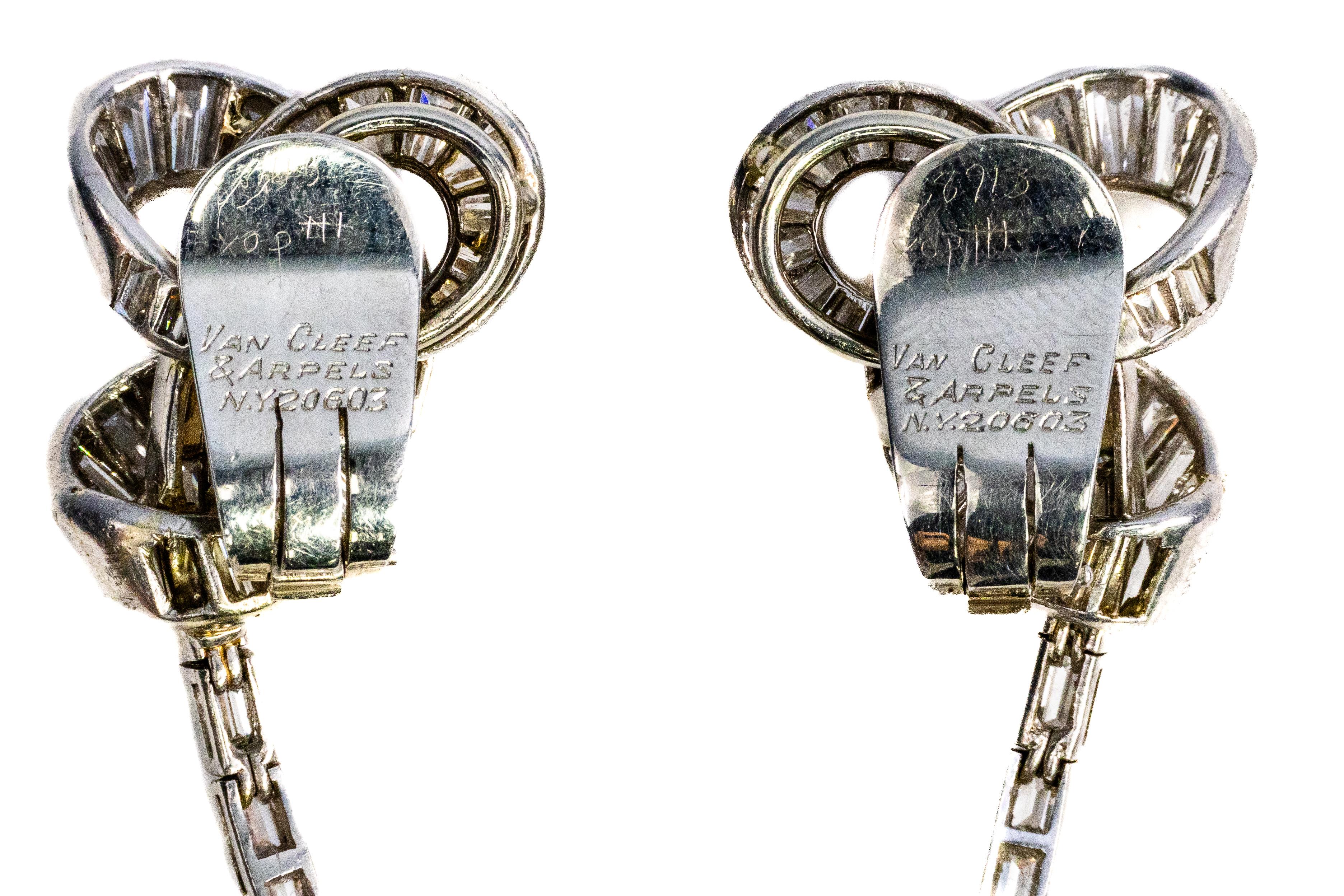 An exquisite pair by Van Cleef & Arpels, these Pear Shape Diamond Earrings embody the brand's commitment to elegance and exceptional craftsmanship. Featuring two stunning pear-shaped diamonds—one weighing 2.63 carats (J VS1) and the other 2.88