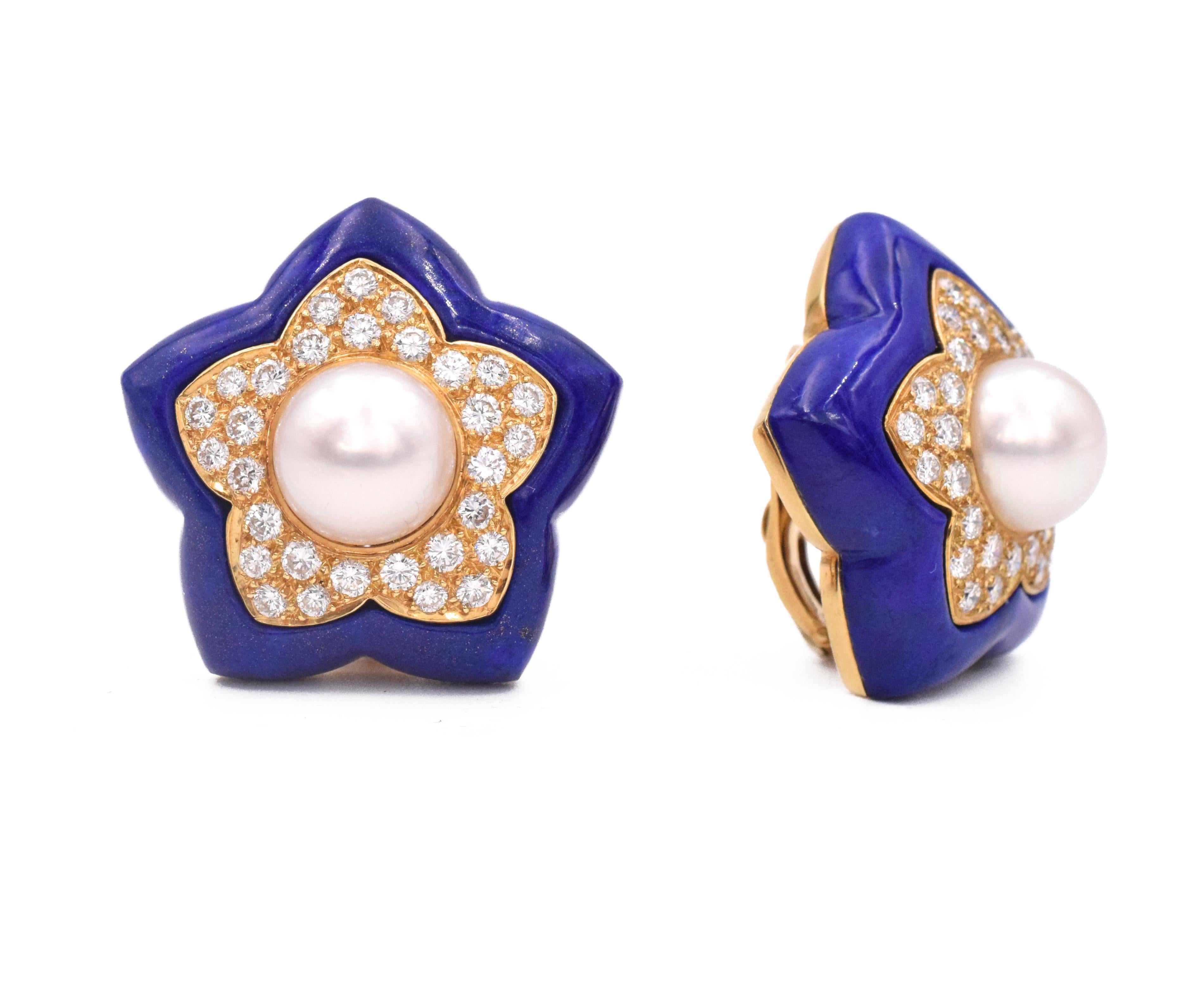 Van Cleef & Arpels pearl, diamond and lapis star earclip earrings in 18k yellow gold. The center of the earrings set with 9.5mm round white cultured pearl, surrounded by a gold star shape plate pave set with approximately 2ct of round brilliant cut