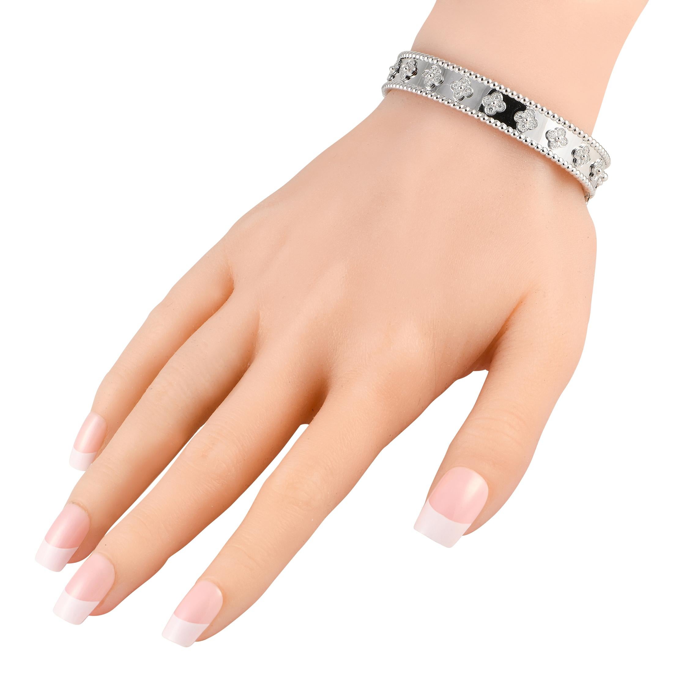 Luck will be on your side with this bracelet on your wrist. This Van Cleef & Arpels Perle Clovers bracelet in 18K white gold is adorned with diamond-dotted clover motifs. Each clover-shaped motif has its four sectors dotted with a round diamond. At