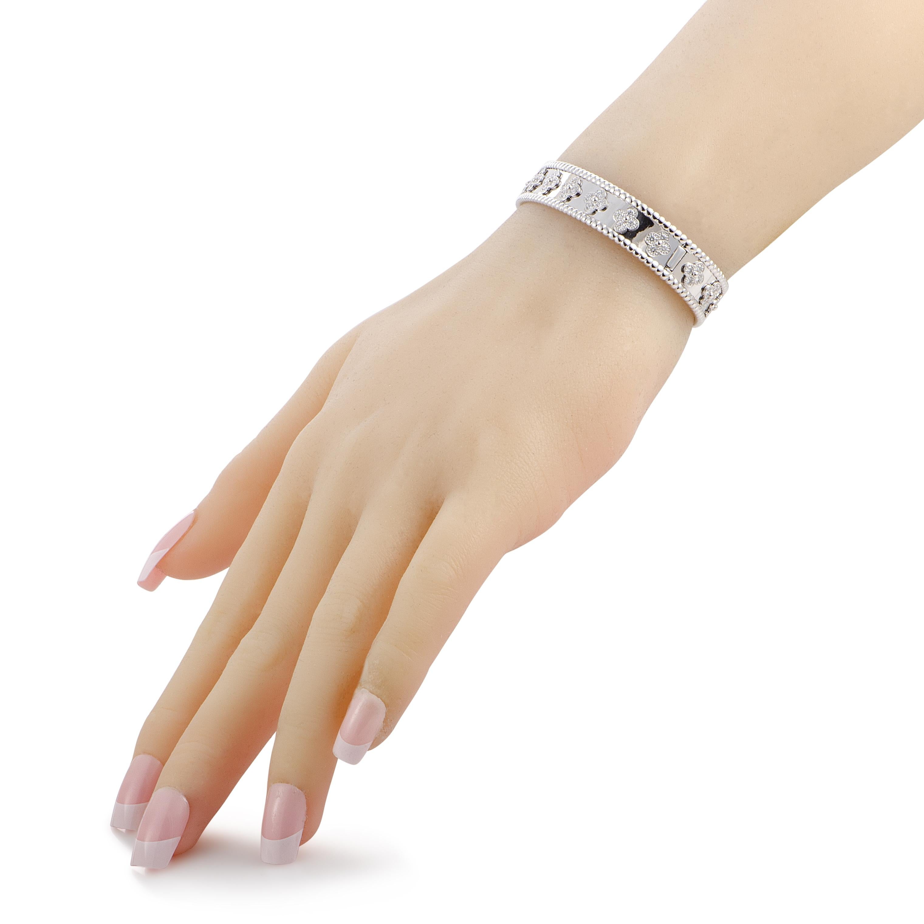 The Van Cleef & Arpels “Perlée” bracelet is made of 18K white gold and set with diamonds. It weighs 32.6 grams, measuring 7.00” in length and boasting a diameter of 2.25” (size S).

Offered in estate condition, this item includes the manufacturer’s