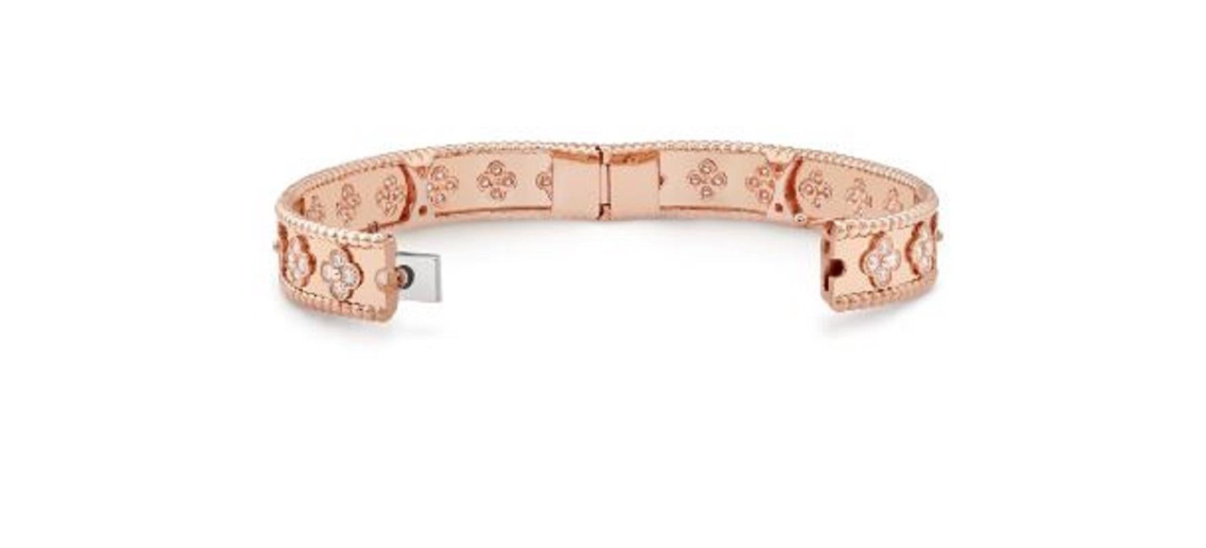 This classic bangle by Van Cleef & Arpels is an essential addition to any wrist stack. This luxurious piece is crafted in 18K rose gold with 1.78 carats of D-F color, IF-VVS clarity round diamonds. It is size extra small, which fits a wrist of