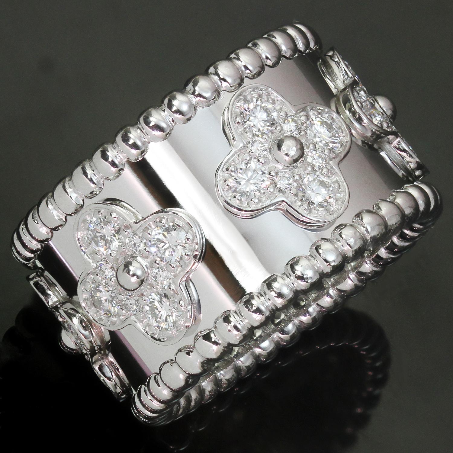 This gorgeous Van Cleef & Arpels band from elegant Perlée Clovers collection is crafted in 18k white gold and features a floral clover design set with round brilliant D-F VVS1-VVS2 diamonds weighing an estimated 0.71 carats. Made in France circa