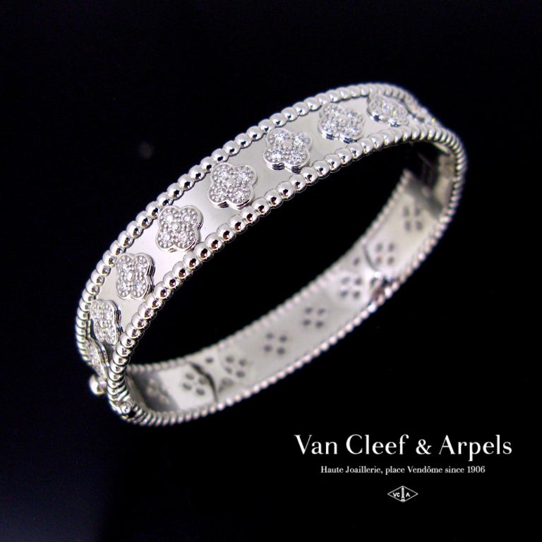 Van Cleef & Arpels on X: Socrate #BetweentheFingerRing #Perlee clover -  signature and diamond bracelets - new catalog    / X
