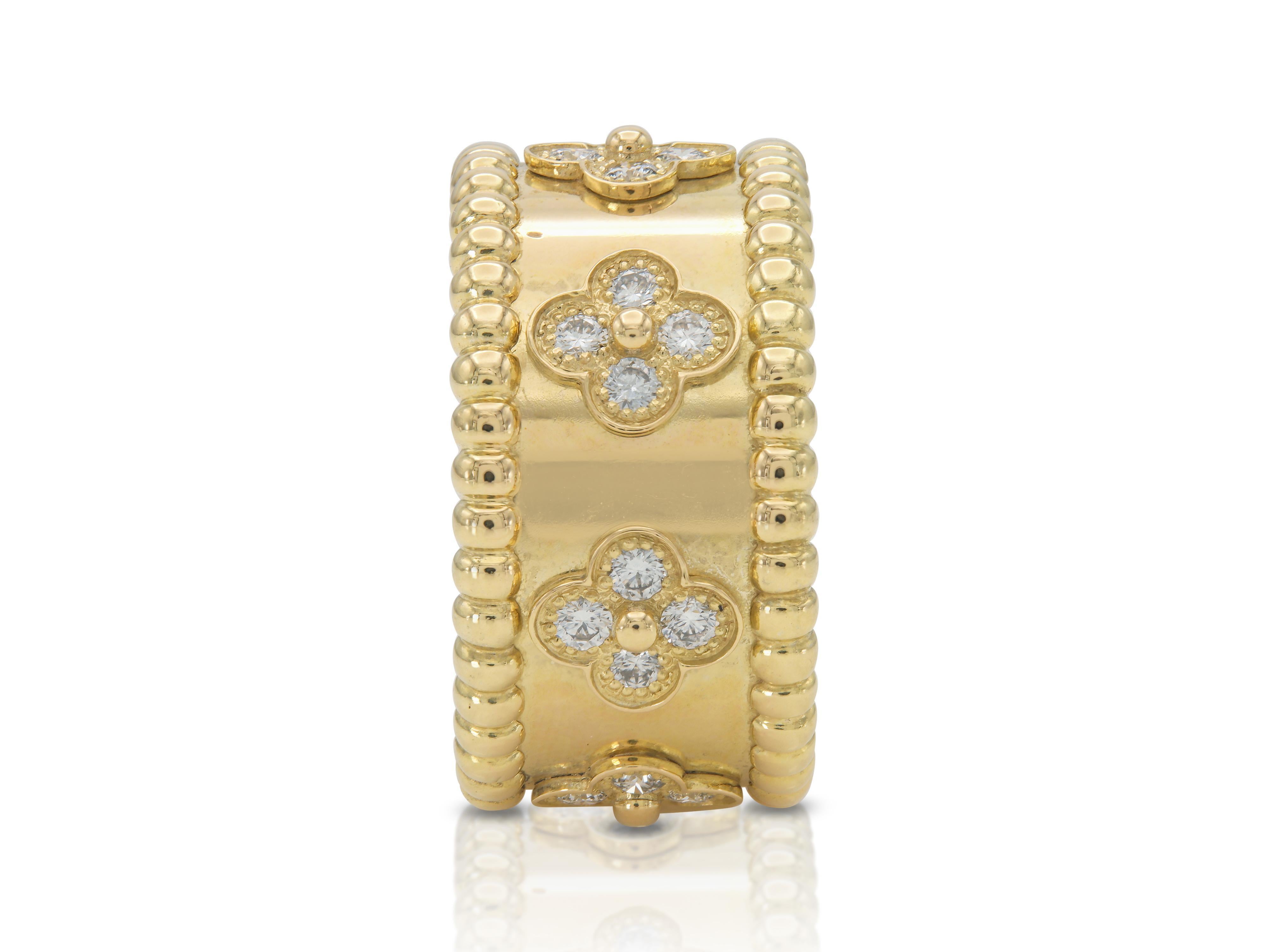 Finely crafted in 18k yellow gold with Round Brilliant cut Diamonds.
Signed by Van Cleef & Arpels
Size 50 (US 5 1/2)