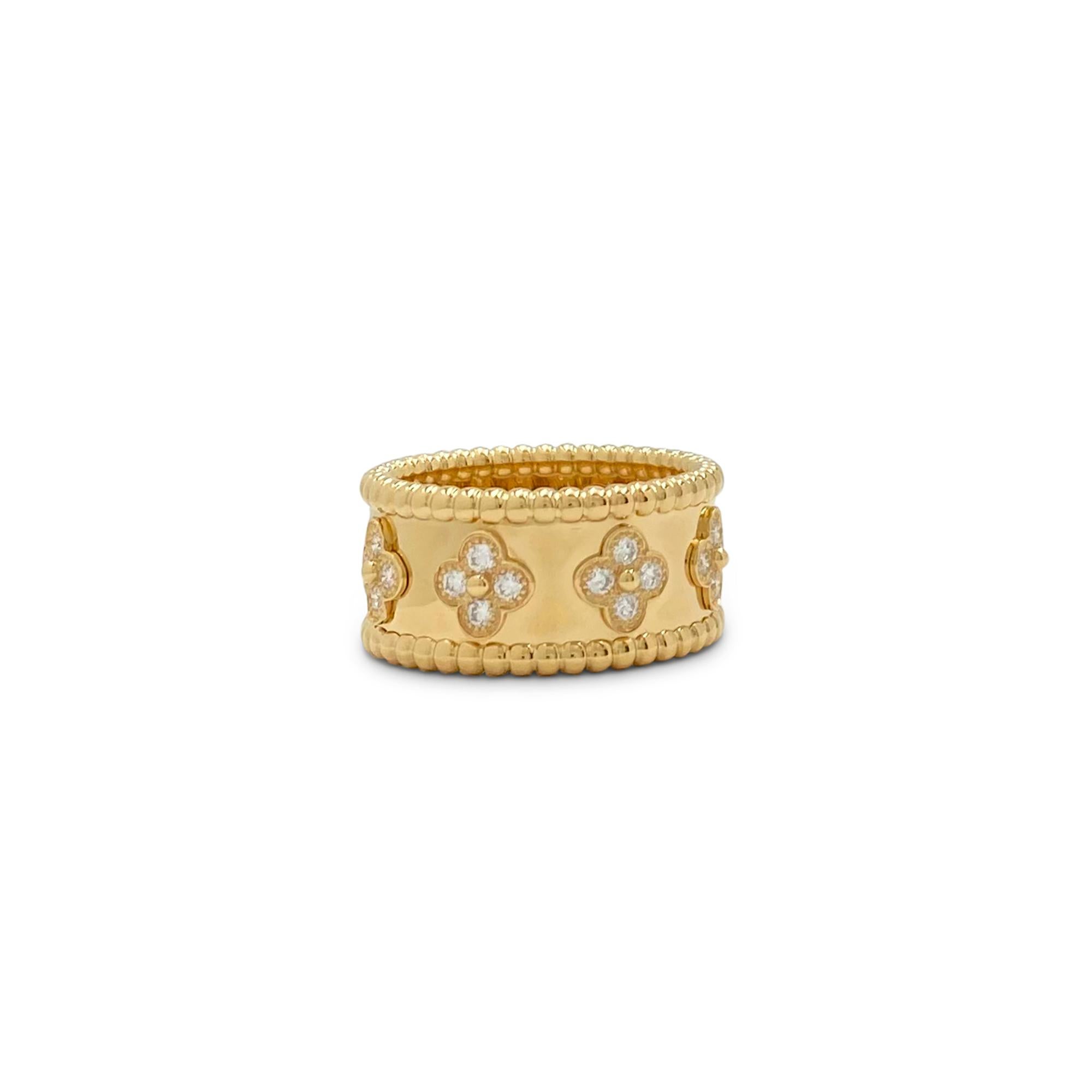 Authentic Van Cleef & Arpels Perlée Clovers ring crafted in 18 karat yellow gold.  Adorned with clover motifs that are set with an estimated .71 carats of high quality (E-F color, VS clarity) round brilliant cut diamonds.  Size 56, US 7.5. Signed