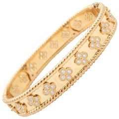 Van Cleef & Arpels Perlée Clovers Yellow Gold and Diamond Bangle