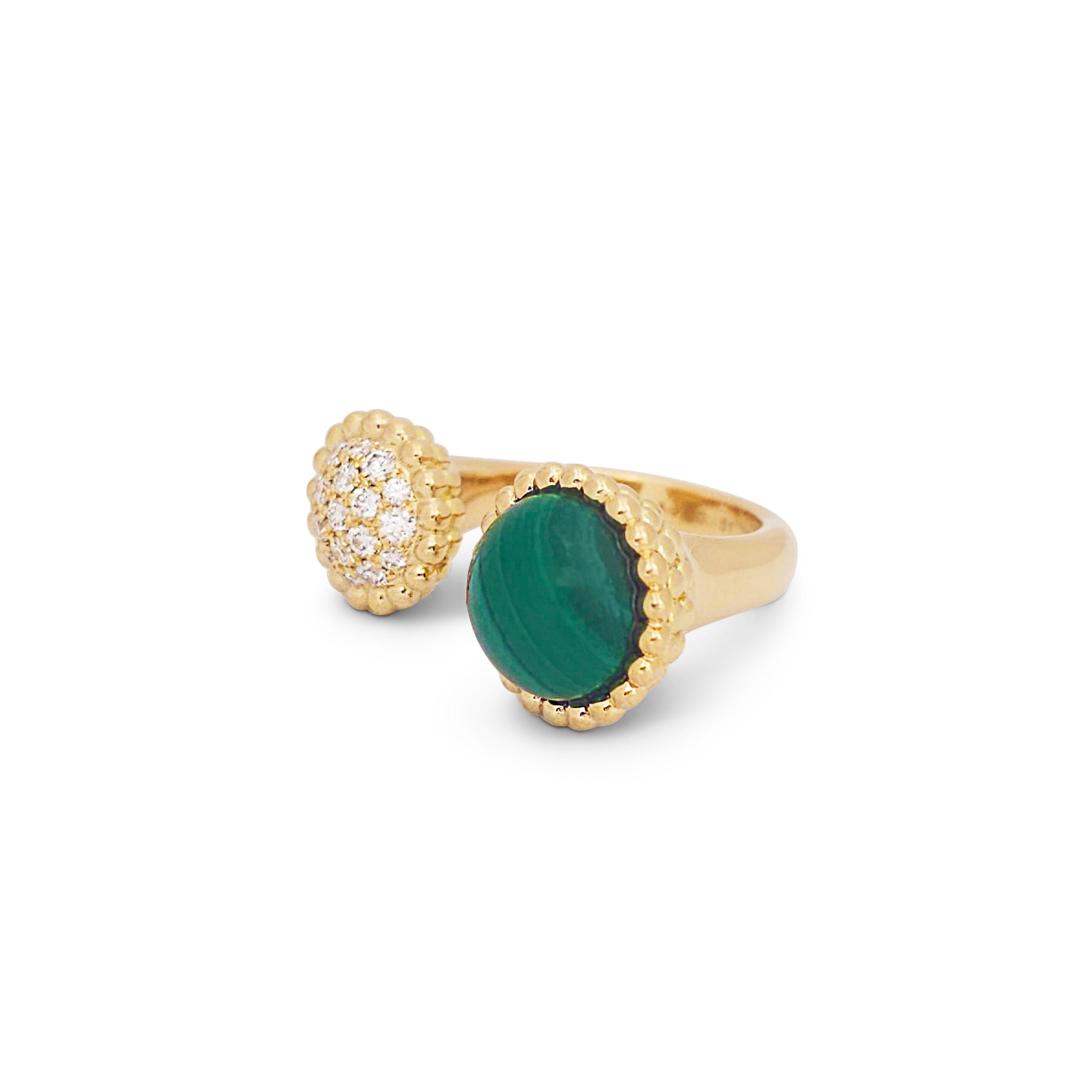 Authentic Van Cleef & Arpels Perlée Couleurs between the finger ring crafted in 18 karat yellow gold.  The split ring is set on one end with a polished cabachon malachite, the other end is set with approximately 0.35 carats of sparkling round cut