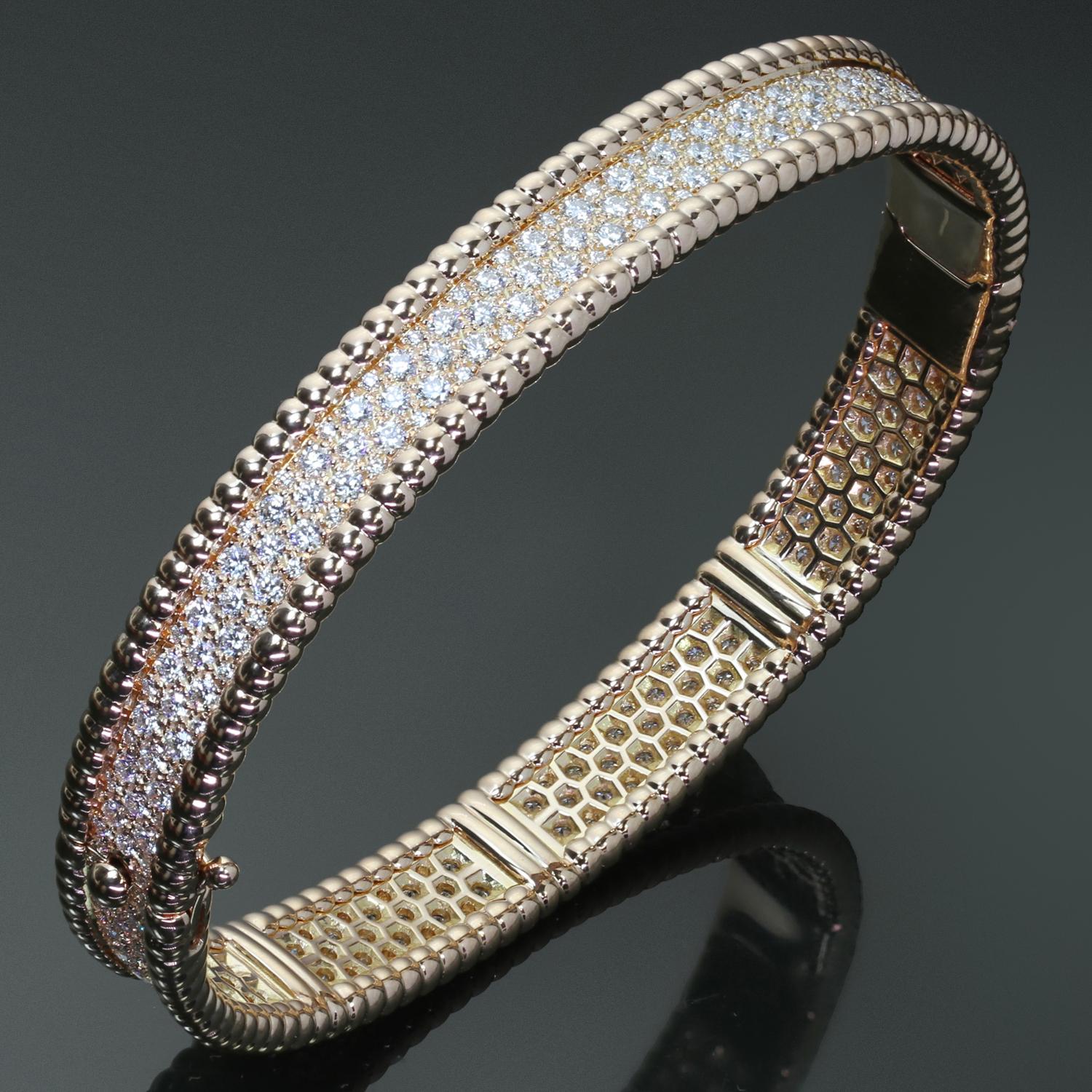 This gorgeous authentic Van Cleef & Arpels bangle from the classic Perlée collection is crafted in 18k rose gold and set with 3 rows of round brilliant D-E-F VVS1-VVS2 diamonds weighing an estimated 3.11 carats. Made in France circa 2010s.