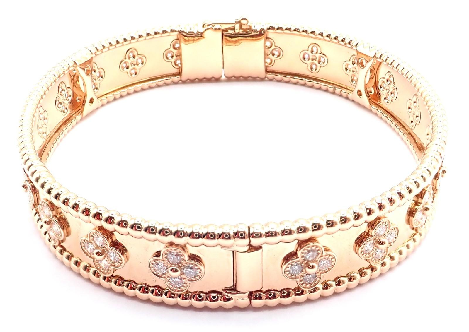 18k Rose Gold Diamond Clover Perlee Bangle Bracelet by Van Cleef 
Arpels.  
This authentic Van Cleef 
Arpels bangle bracelet in 18k rose gold features signature diamond clover motifs, elegantly set in a beaded border design. 
Crafted with