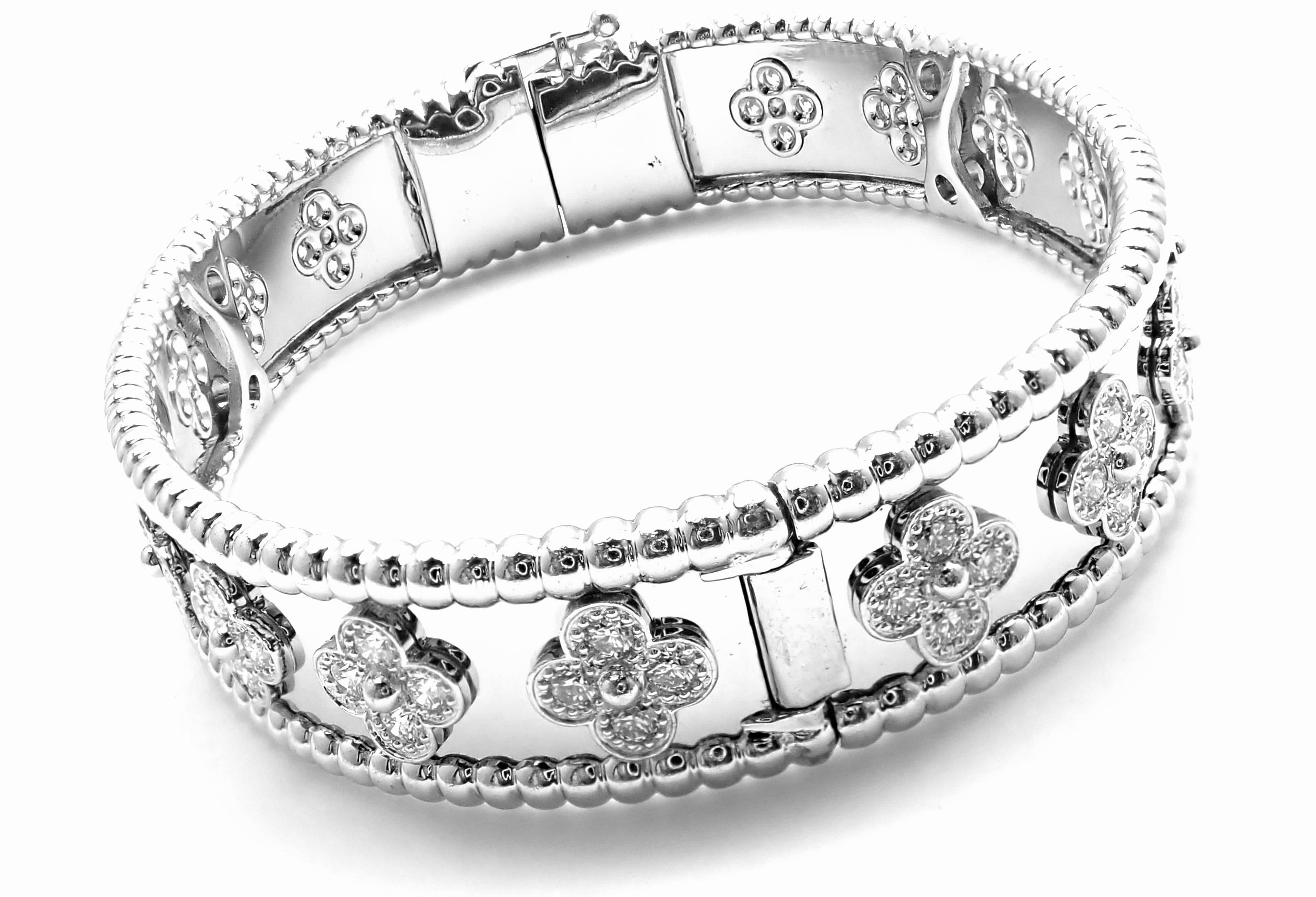 18k White Gold Diamond Clover Perlee Bangle Bracelet by Van Cleef & Arpels. 
With 72 brilliant round cut diamond VVS1 clarity, E color
Total weight approx. 1.60ct
This bracelet comes with Van Cleef & Arpels service paper from VCA store in Japan and