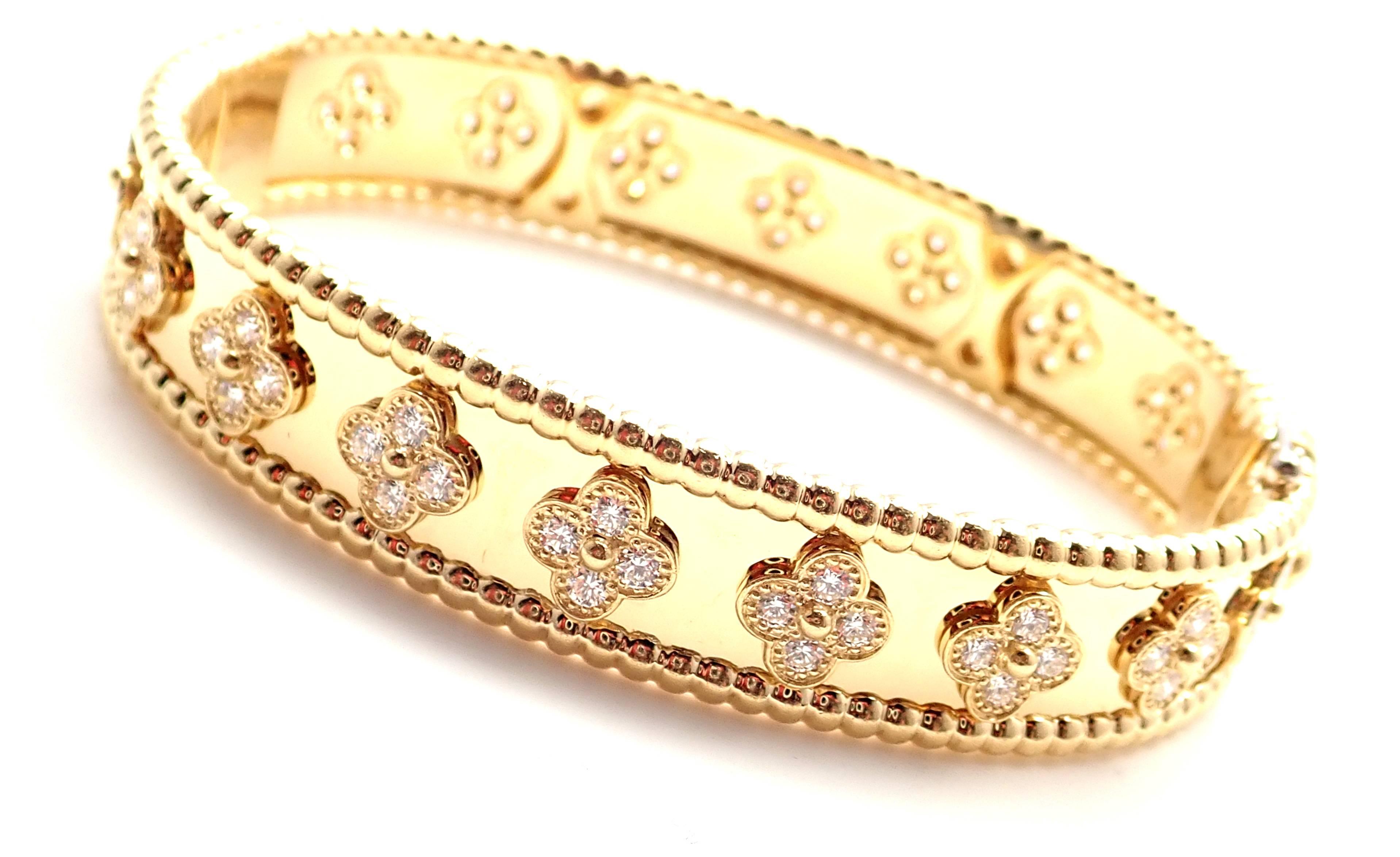 18k Yellow Gold Diamond Clover Perlee Bangle Bracelet by Van Cleef & Arpels.  
With 72 brilliant round cut diamond VVS1 clarity, E color
Total weight approx. 1.60ct
This bracelet comes with Van Cleef & Arpels service paper from VCA store in Japan