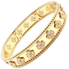 Van Cleef & Arpels Perlée Diamond Clover Yellow Gold Bangle Bracelet