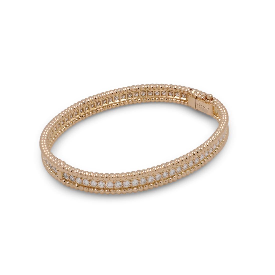 Authentic Van Cleef & Arpels 'Perlée Diamonds' bracelet crafted in 18 karat rose gold features a single row of high-quality round brilliant cut diamonds weighing an estimated 1.94 carats total weight (G, VS). Signed VCA, Au750, XS, with serial