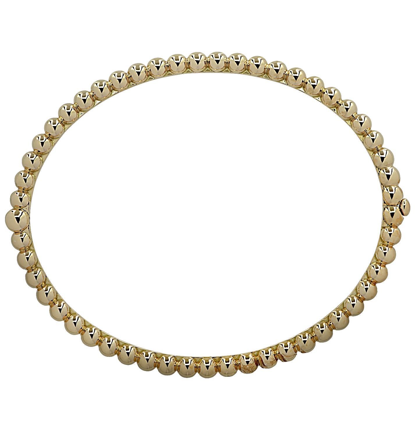 From the legendary House of Van Cleef & Arpels, this timelessly elegant Perlee Pearls of Gold Bracelet, is hand crafted in 18 karat yellow gold. The bracelet closes seamlessly with an invisible clasp. It measures 3.4 mm in width and is a wrist size