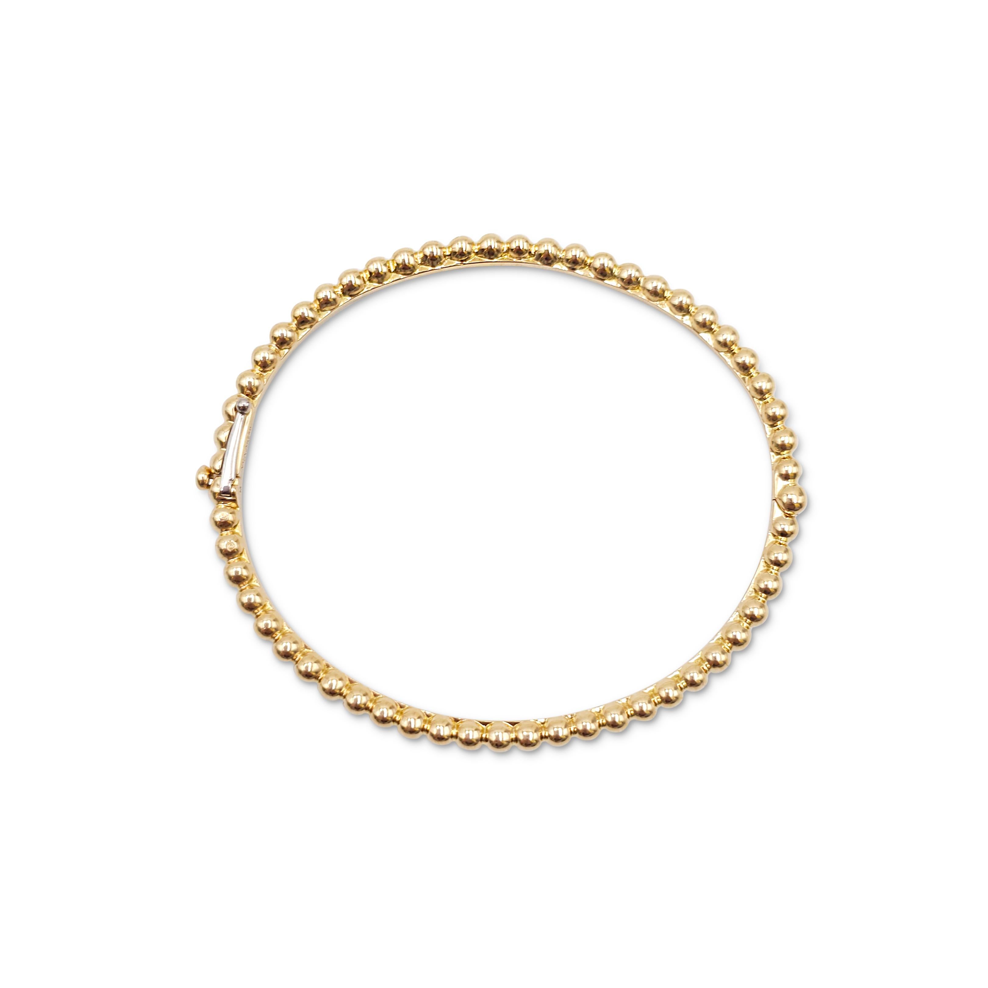 Authentic Van Cleef & Arpels Pearls of Gold bracelet from the Perlée collection crafted in 18 karat yellow gold.  The bracelet is comprised of a single row of perlée beads.  Size medium (will fit a 6.3 inch wrist).  Signed VCA Au750, M, with serial