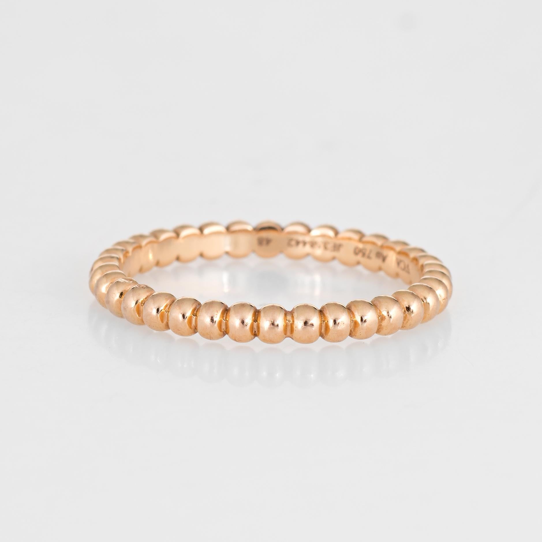 Finely detailed Van Cleef & Arpels estate ring from the Perlee collection crafted in 18k yellow gold. 

The stylish ring features gold pearls in a single line around the entire band. Great worn alone or stacked with your fine jewelry from any