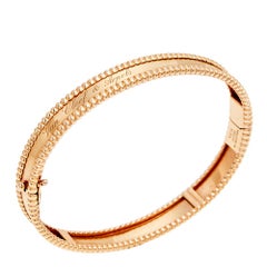 Van Cleef & Arpels Bracelet jonc signature Perlee en or rose 18 carats, taille M