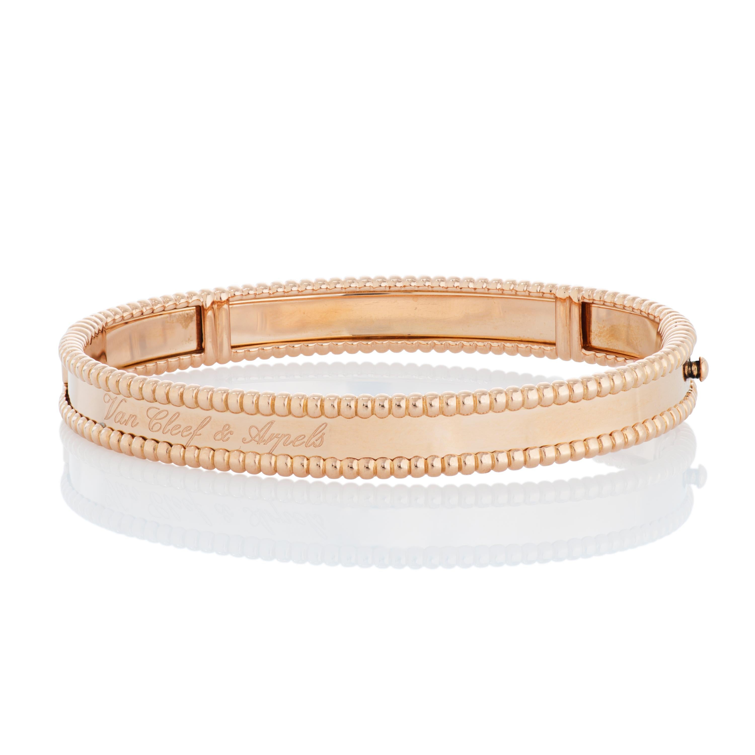 Van Cleef & Arpels Perlee signature bangle bracelet in 18k rose gold, accompanied by VCA box and VCA certificate of authenticity. 

This VCA bangle features 