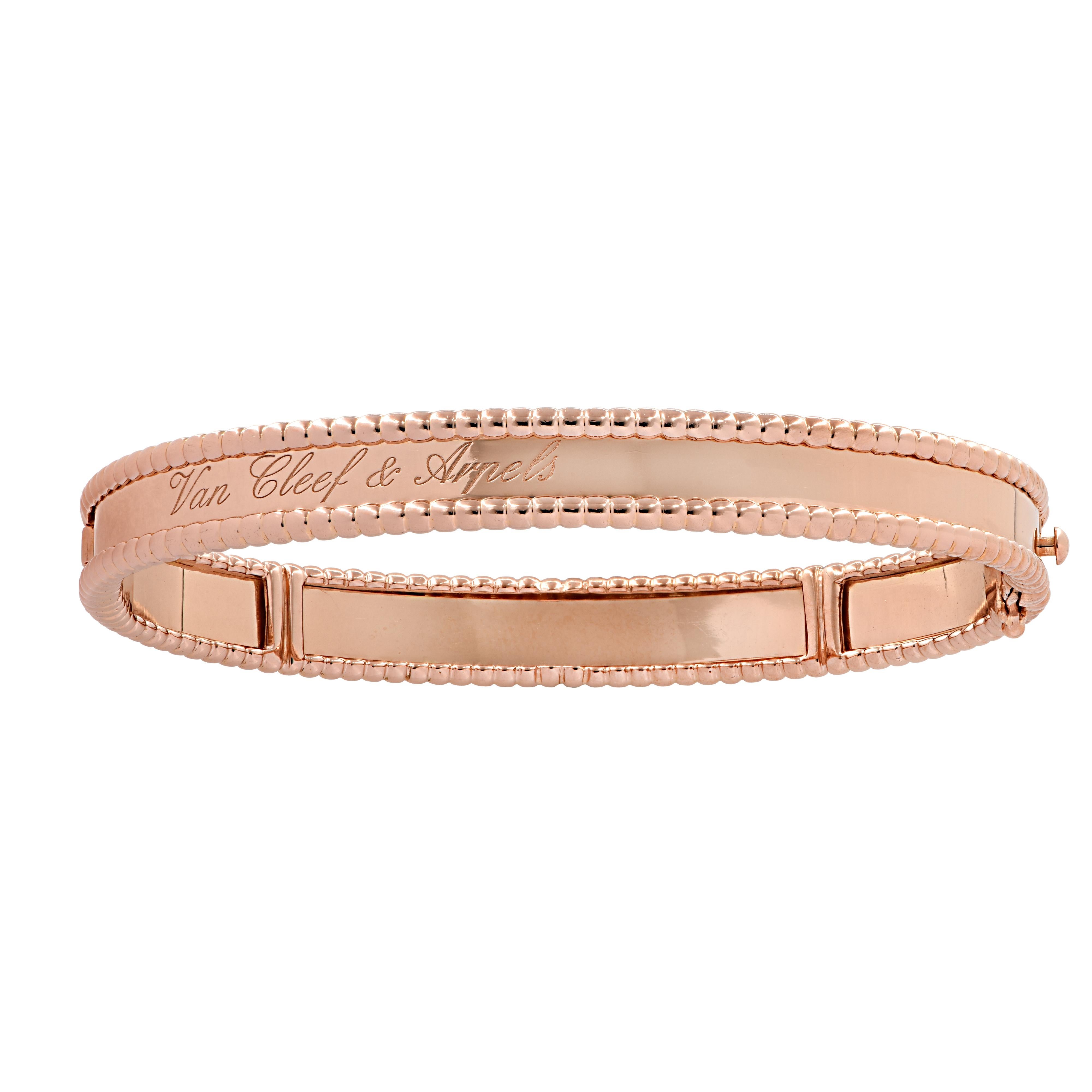 From the legendary House of Van Cleef & Arpels, this timelessly elegant Perlee Signature Bracelet, hand crafted in 18 karat rose gold, features the iconic Van Cleef & Arpels signature on a highly polished band embellished with small rose gold pearls