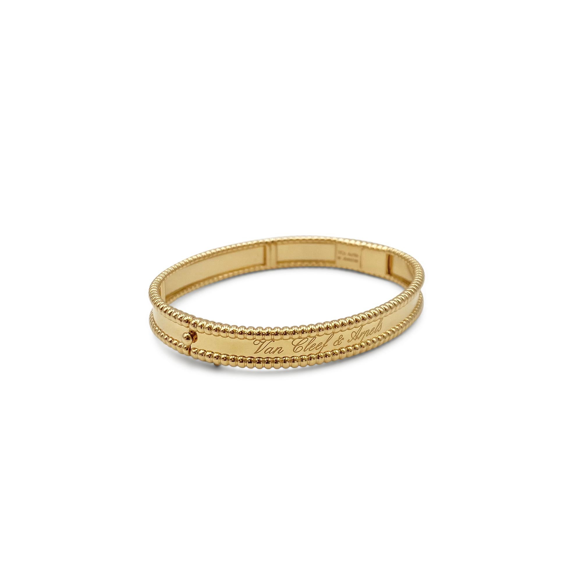 Authentic Van Cleef & Arpels Perlée Signature bracelet crafted in 18 karat yellow gold.  The high polished gold bangle features Van Cleef & Arpels signature and distinctive perlée border.  Size M, 6.3-inch internal circumference.  Signed VCA, Au750,