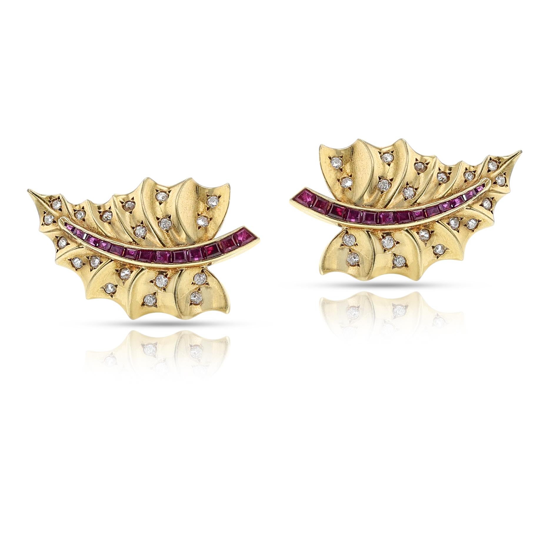 A pair of Van Cleef & Arpels Pery et Fils Natural Ruby and Diamond Leaf Earrings, 18k with Certificate of Authenticity dated October 2024. The diamonds weigh appx. 0.75 carats. Circa 1947. The total weight of the earring is 14.16 grams. The