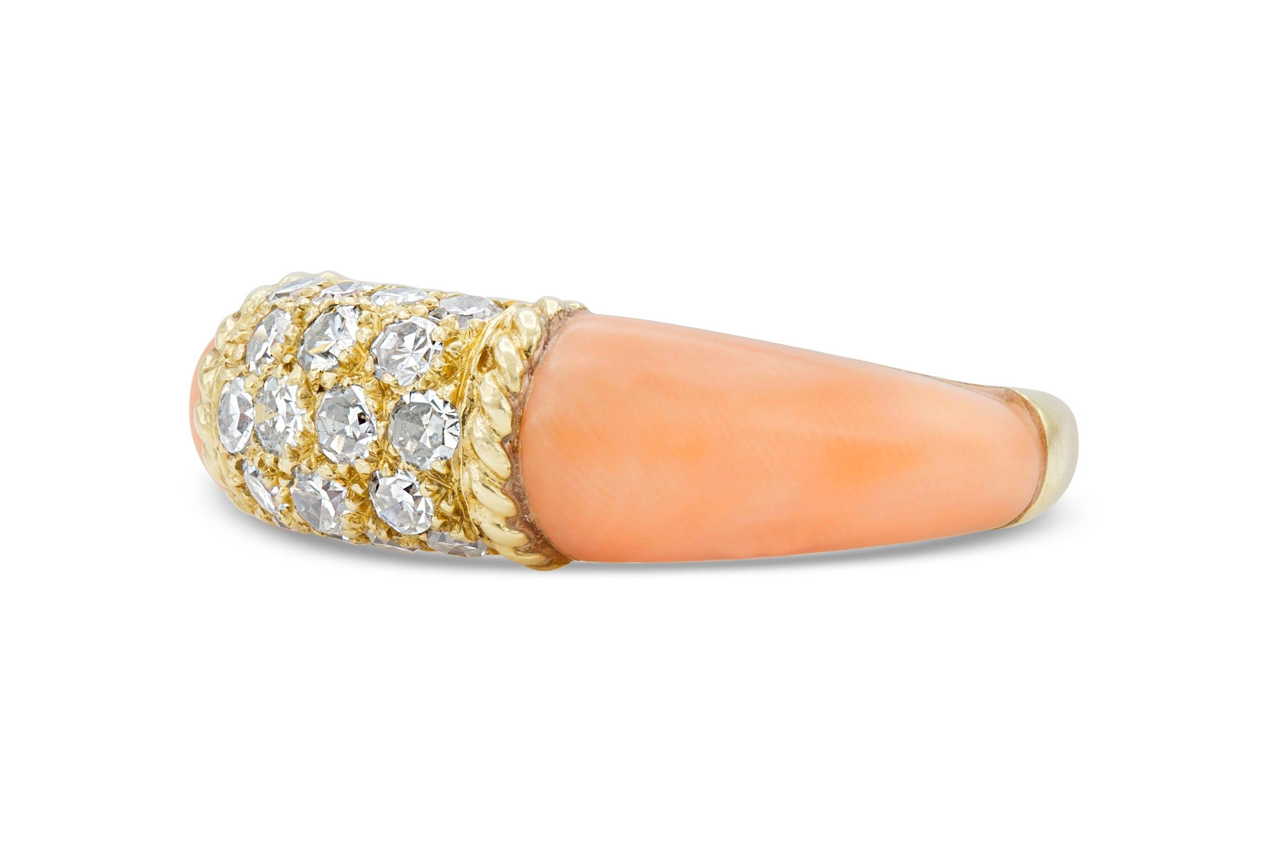 Finely crafted in 18k yellow gold with coral and round brilliant cut diamonds weighing approximately a total of 0.50 carat.
Signed by Van Cleef & Arpels
Size 5 3/4