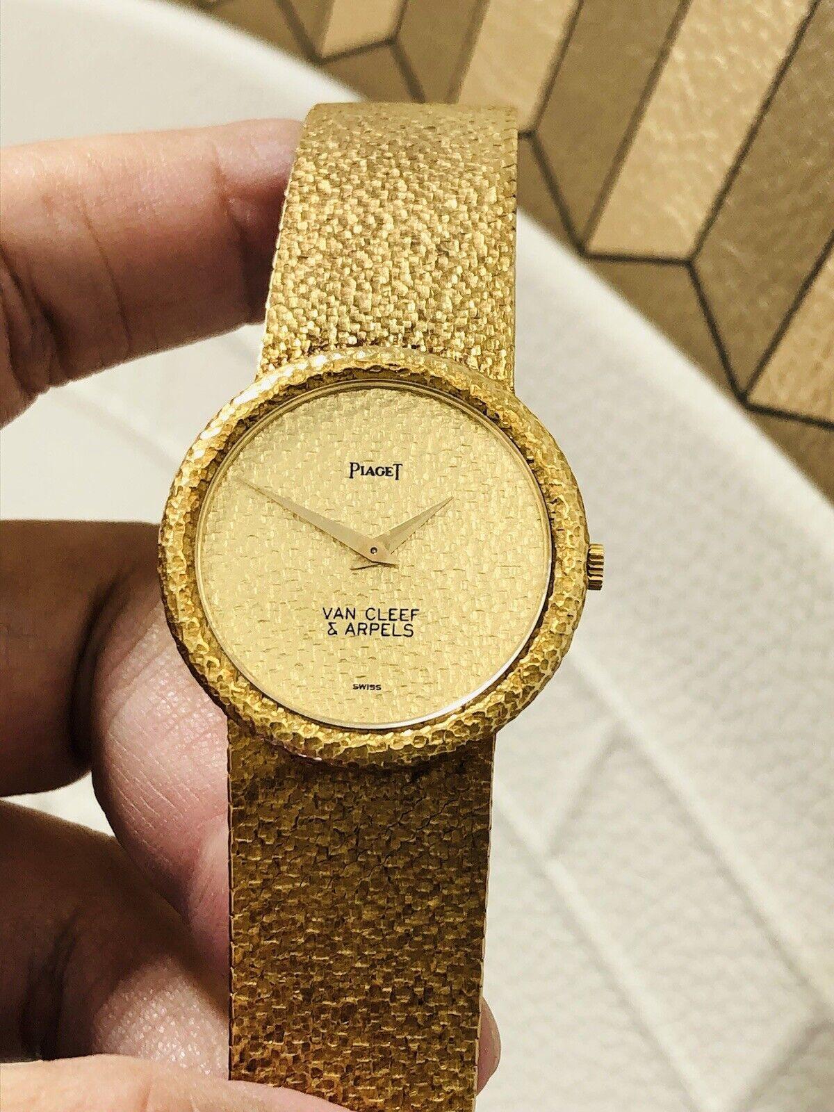 Van Cleef & Arpels Piaget 18k Hammered Yellow Gold Watch Men's Circa 1970s

Here is your chance to purchase a beautiful and highly collectible designer watch!

The dial is 100% original in champagne with original solid gold sword hands and