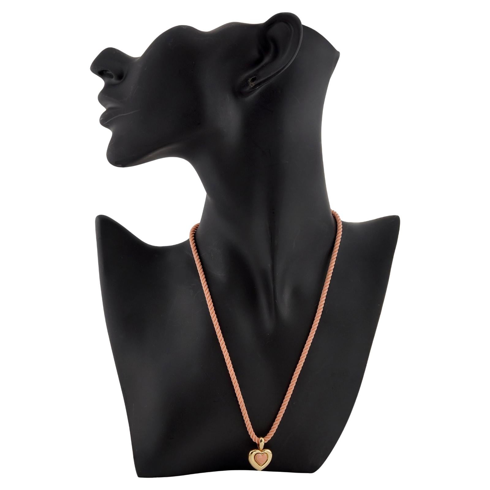 VAN CLEEF & ARPELS Pink Coral Yellow Gold Silk Cord Pendant Necklace In Good Condition For Sale In New York, NY
