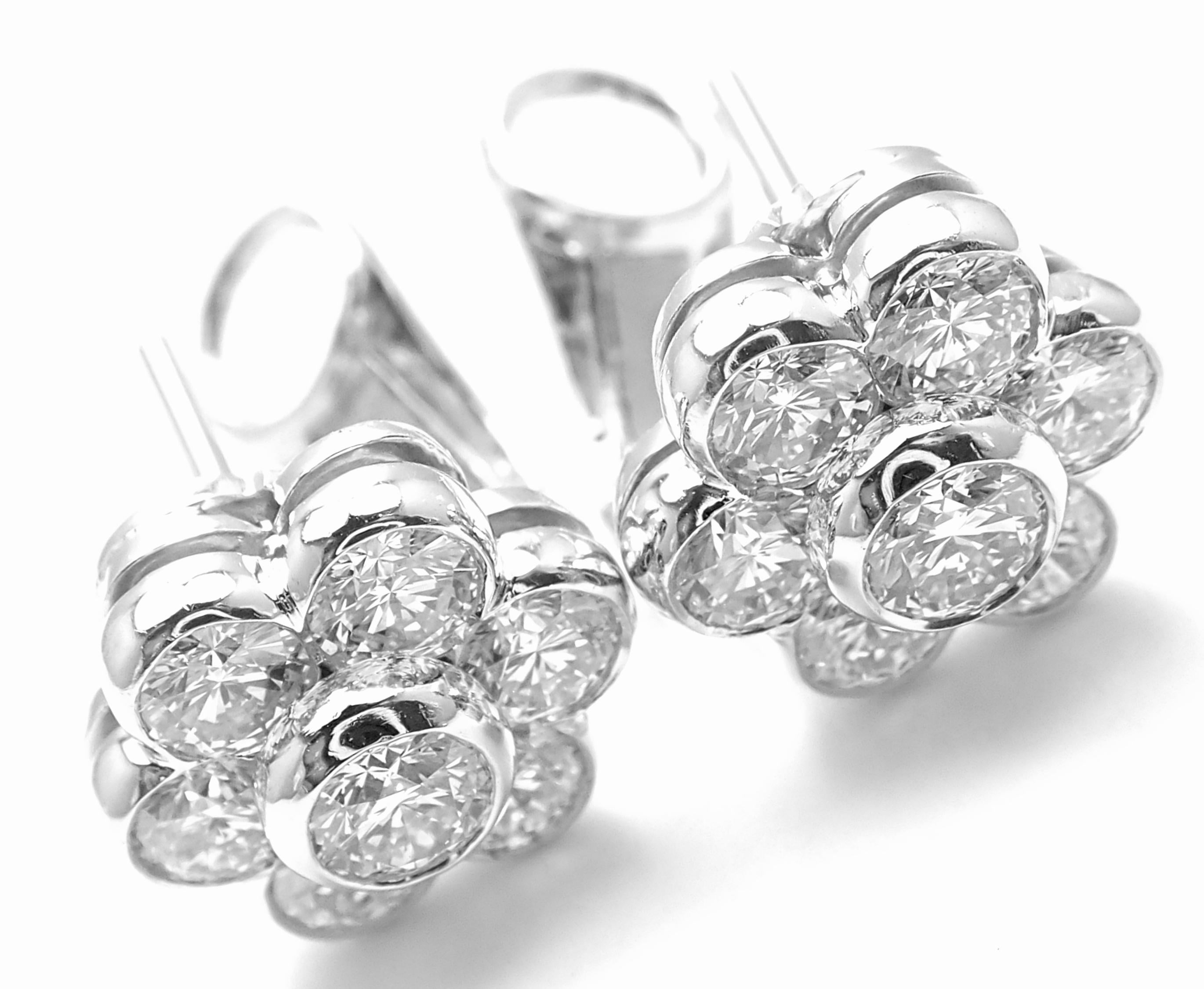 Platinum Diamond FLower Earrings by Van Cleef & Arpels. 
With 13 round brilliant cut diamonds VVS1 clarity, E color total weight approx. 3.25ct
These earrings come with VCA service paper from NYC and a VCA box.
***These earrings are for pierced