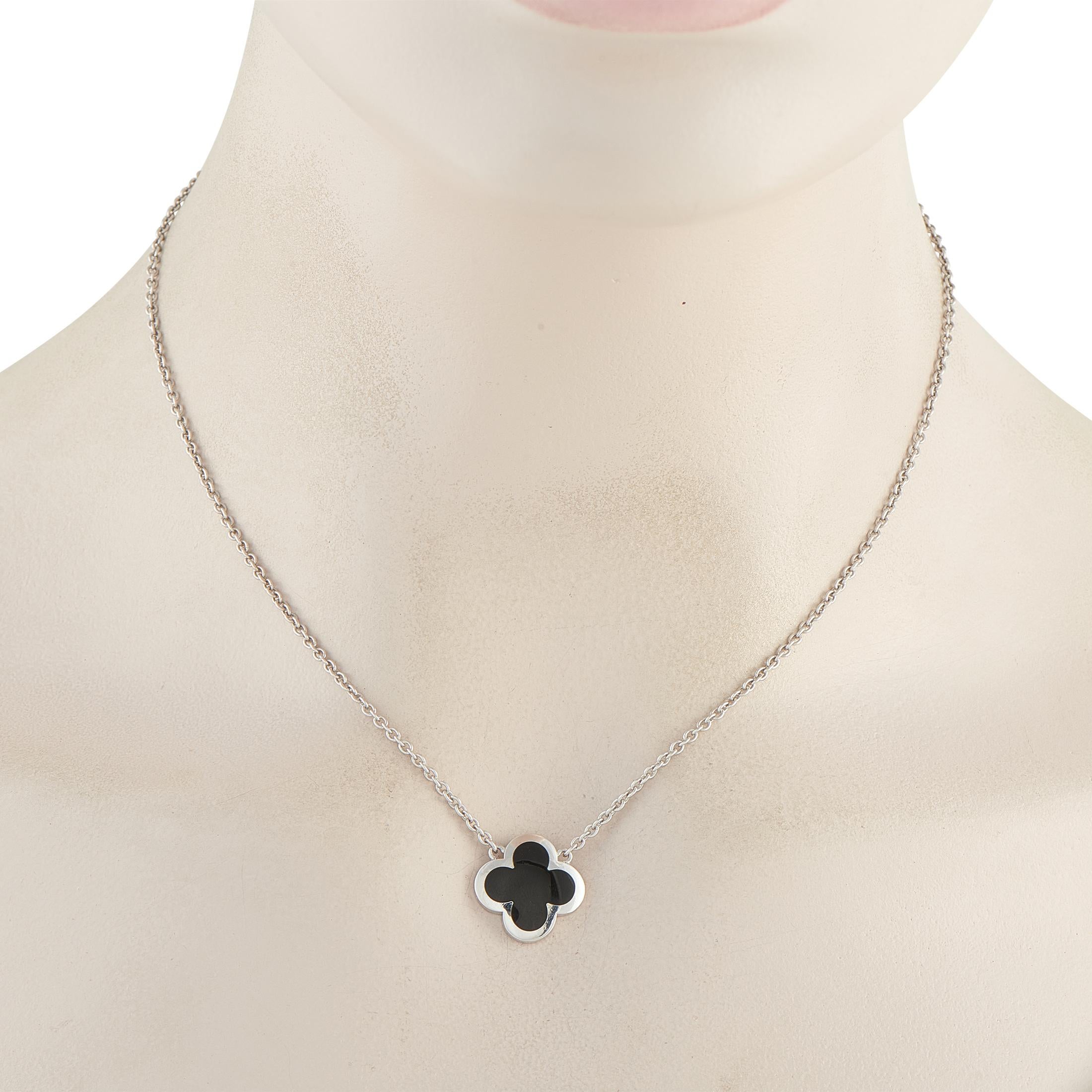 This Van Cleef & Arpels Pure Alhambra necklace is sleek and incredibly sophisticated. Set in 18K White Gold, the pendant offers a streamlined take on the brands signature clover motif. Suspended from a 16 chain, the contrasting black pendant