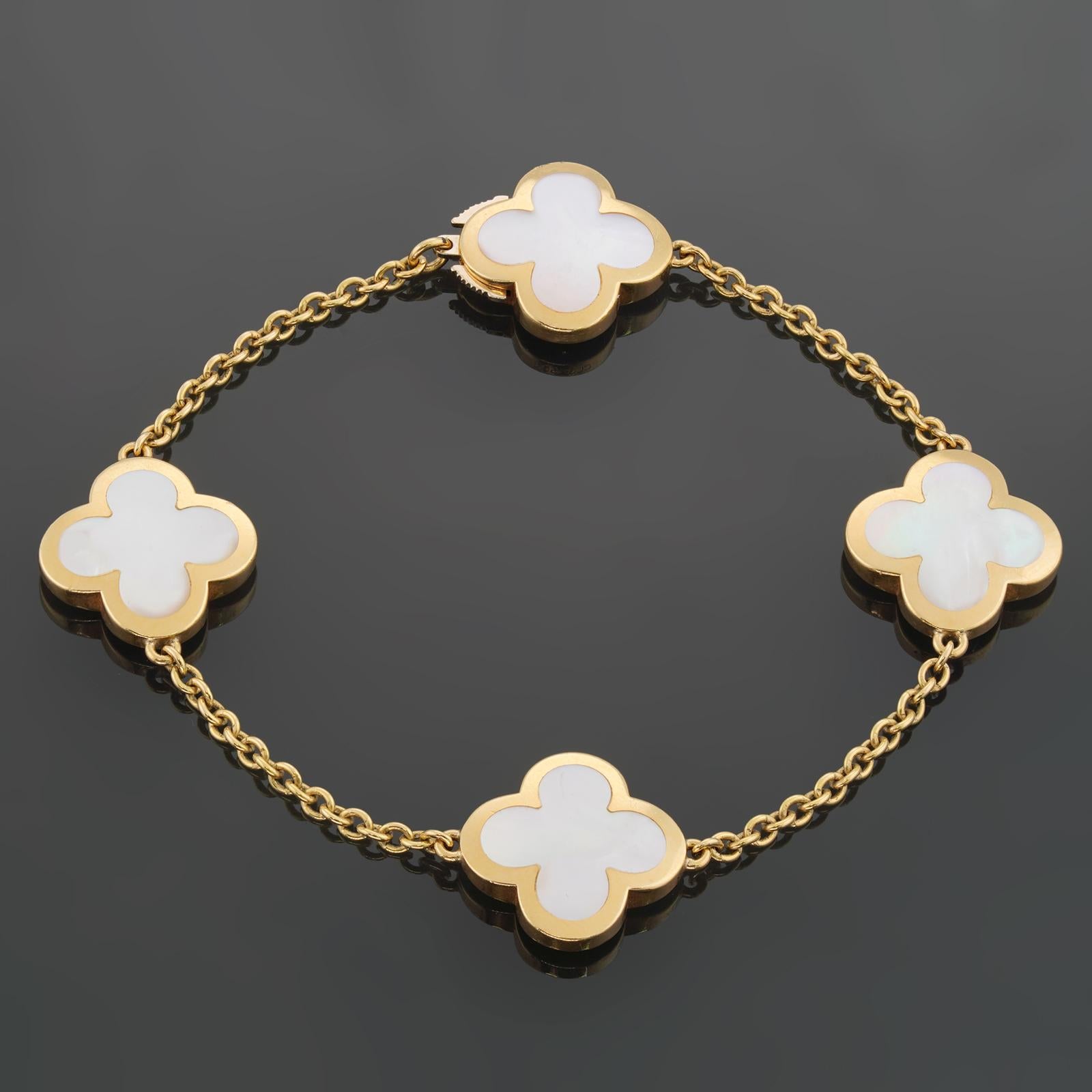 This fabulous Van Cleef & Arpels bracelet from the Pure Alhambra collection is crafted in 18k yellow gold and features 4 lucky clover motifs inlaid with mother-of-pearl. Completed with a concealed clasp. Made in France circa 2010s. Measurements: