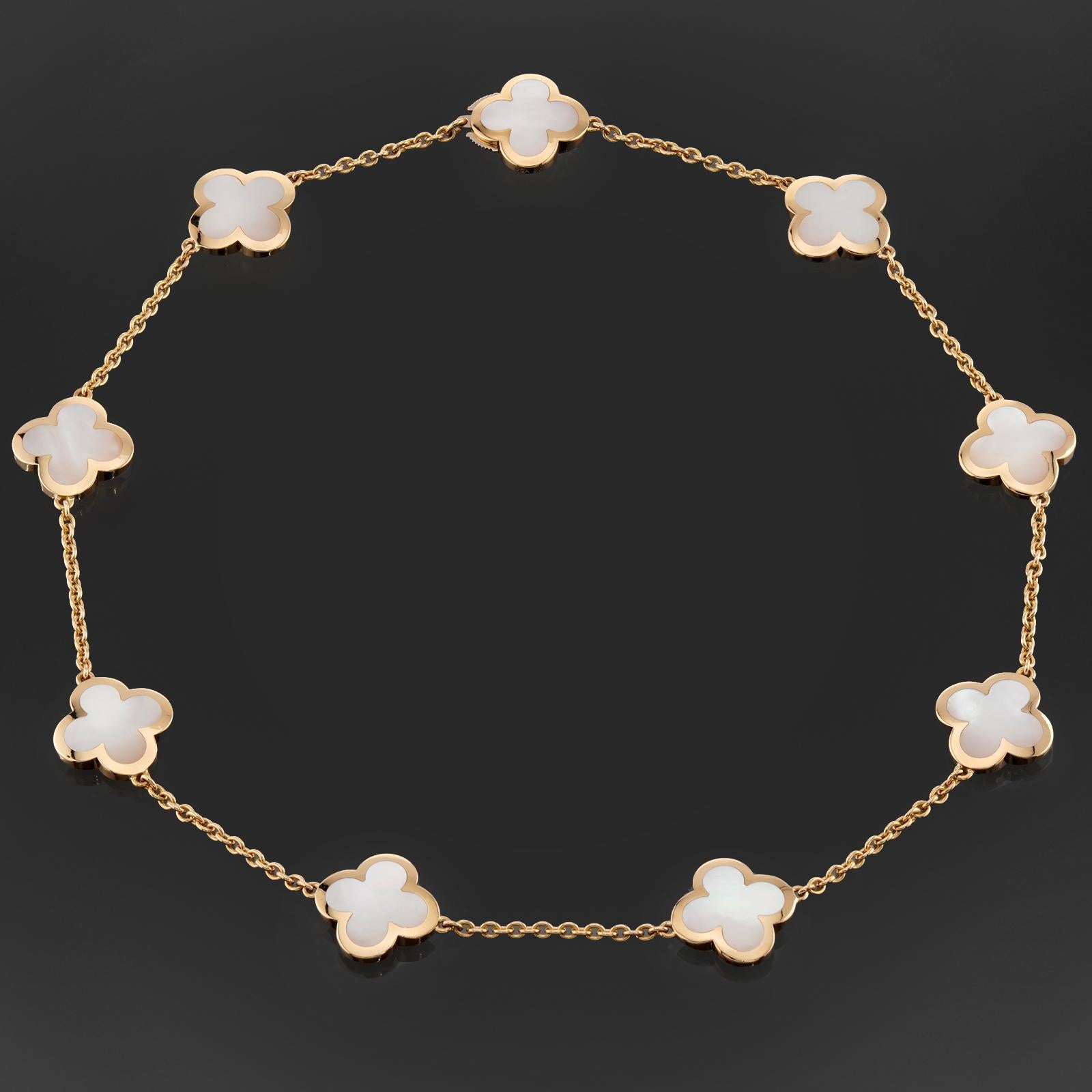This fabulous Van Cleef & Arpels necklace from the iconic Pure Alhambra collection is crafted in 18k yellow gold and features 9 lucky clover motifs inlaid with mother-of-pearl. Completed with an invisible clasp. Made in France circa 2010s. 