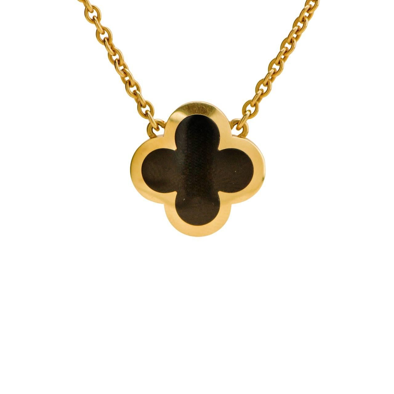 Van Cleef & Arpels Halskette mit Anhänger aus 18 Karat Gelbgold mit reinem Alhambra-Onyx und schwarzem Onyx