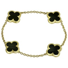 Van Cleef & Arpels Armband aus Gelbgold mit reinem Alhambra-Onyx