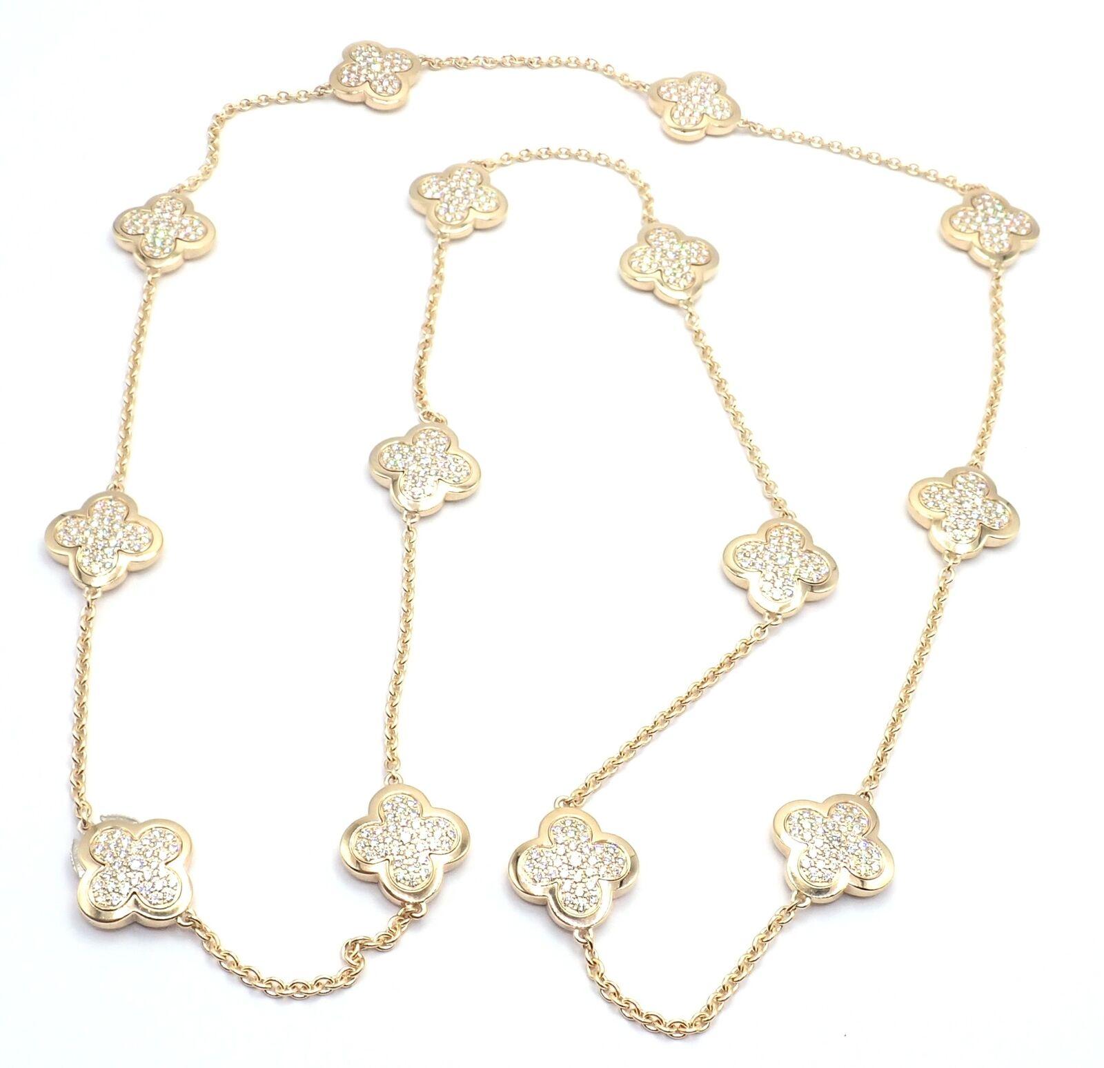 18k Yellow Gold Pure Alhambra 14 Motifs Diamond Necklace by Van Cleef & Arpels.
With 14 diamond pave Alhambra motifs 16mm each VVS1 clarity, E color total weight approximately 5.45ct
This necklace comes with a VCA box and an original receipt from a